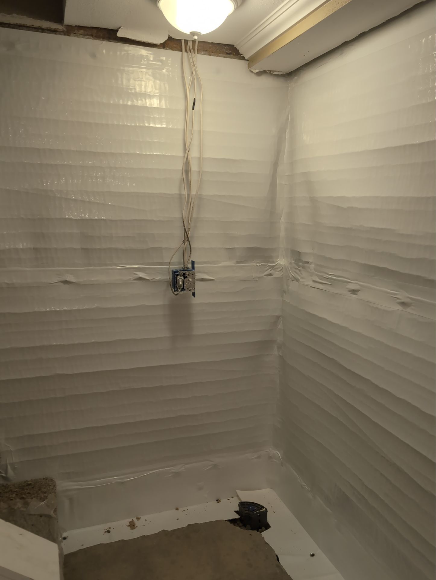 Interior Basement Waterproofing System and Egress Window Installation by Toledo Basement Repair 