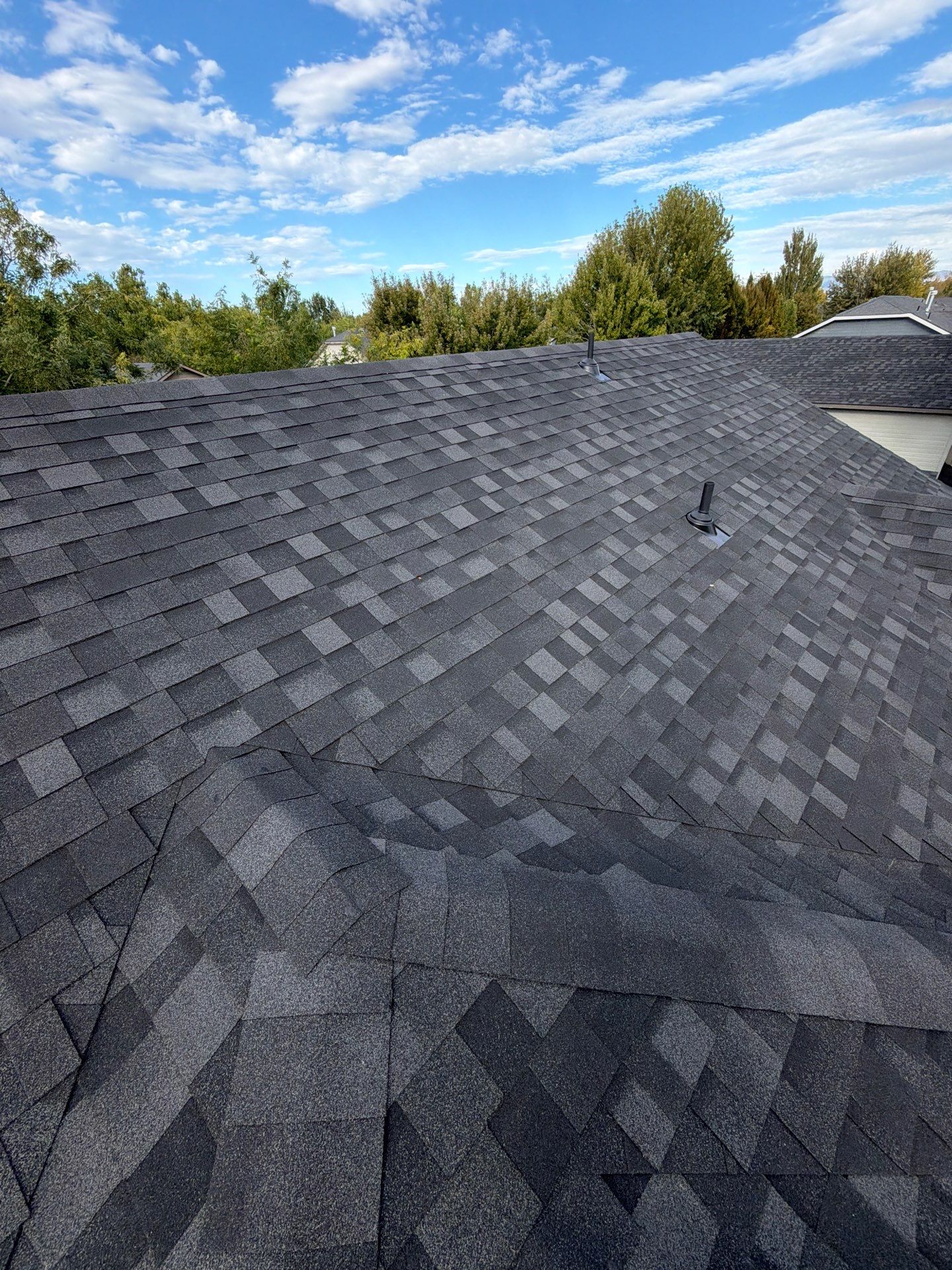 Residential Roof Replacement in Meridian Featuring Charcoal Architectural Shingles by Olive Roofing