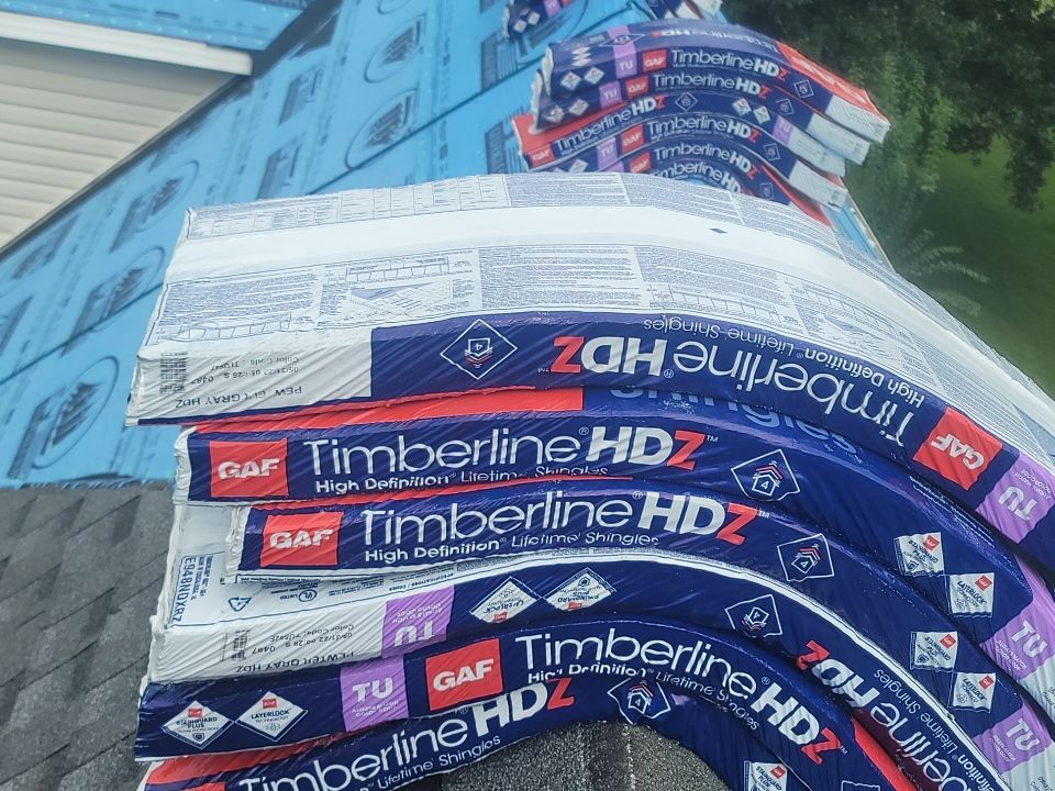 Residential Roofing Installation using Roof Replacement by American Roofing & Construction LLC