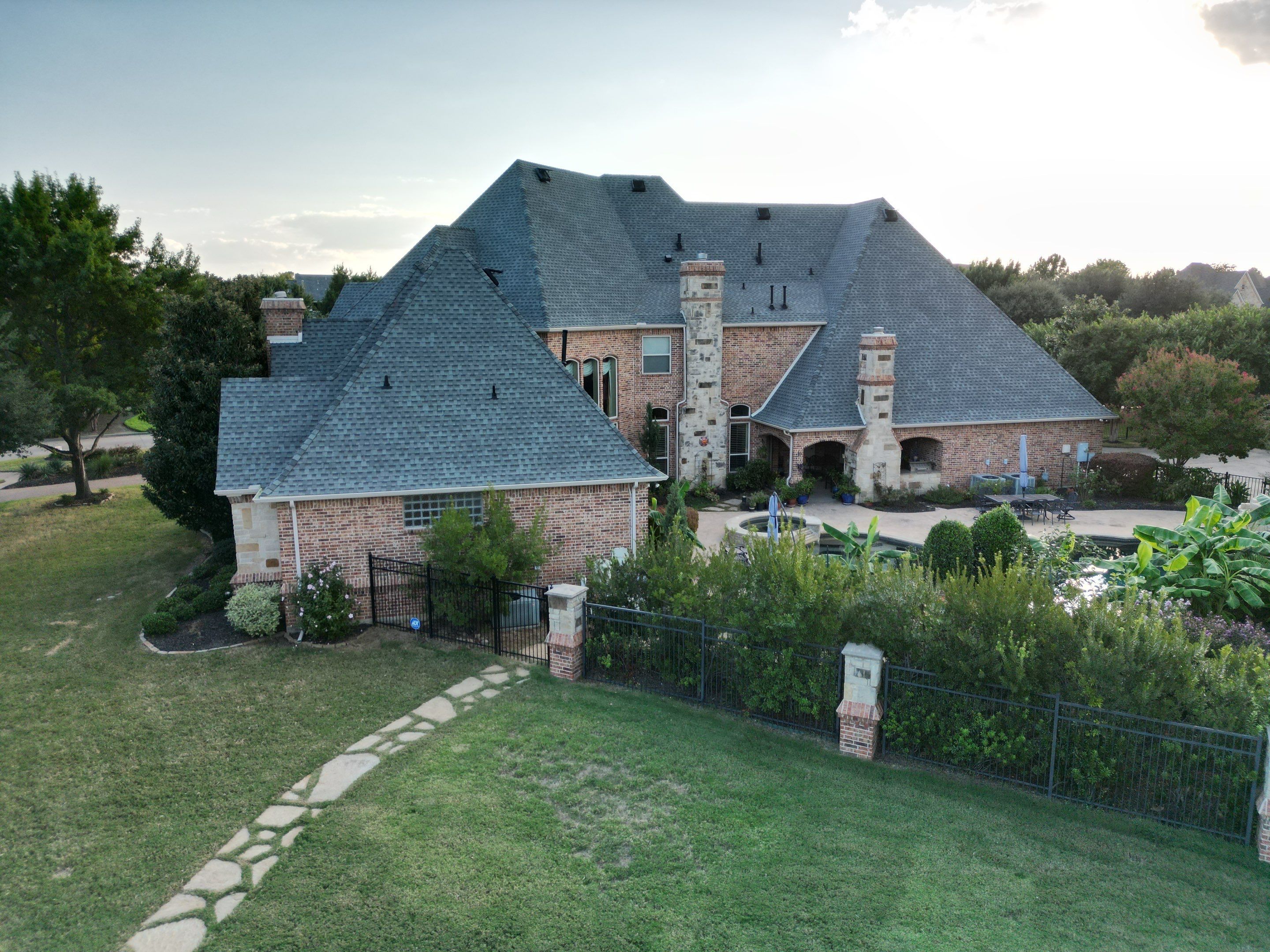 Southlake Texas Estate - Roof, Copper Awning and Gutter Project by First United Roofing & Construction