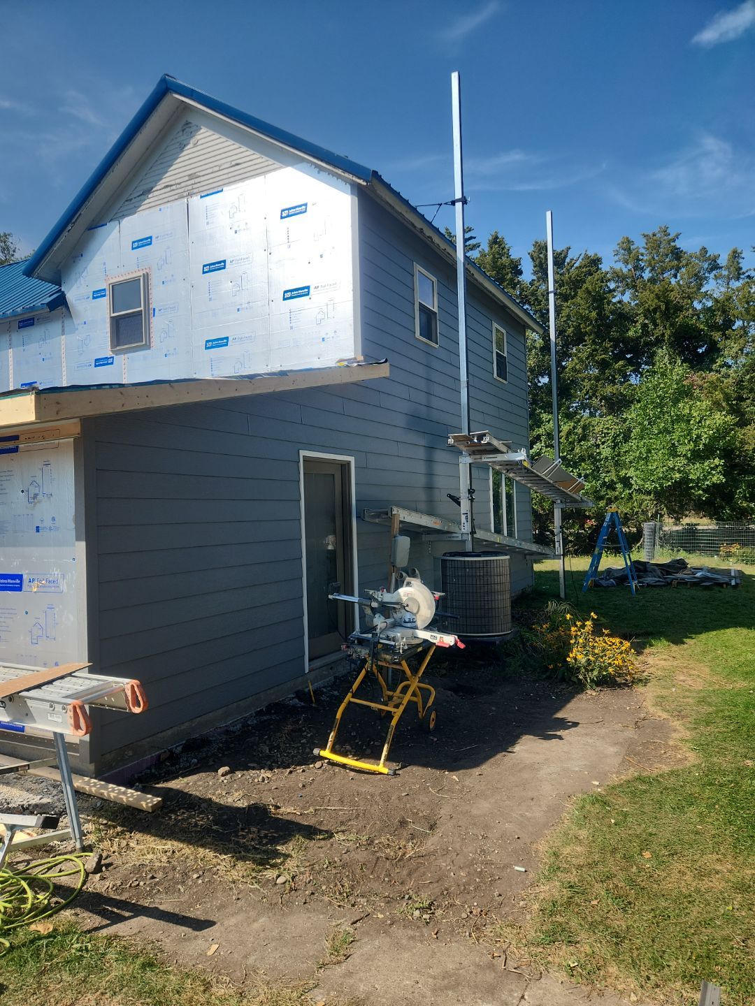 Reside and addition by Homebound Construction