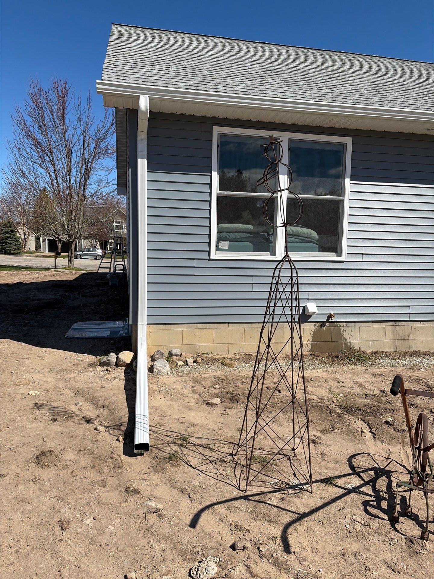 Gutter System Installation for New Home Construction in Petoskey by Rainbow Seamless Systems