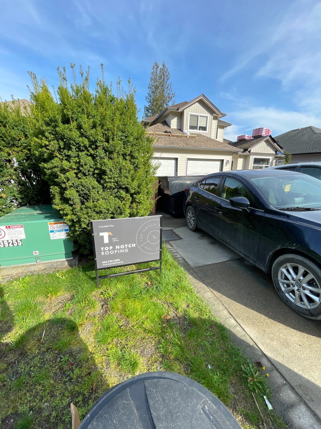 Residential Roofing Installation using OC Oakridge shingles by Top Notch Roofing Inc