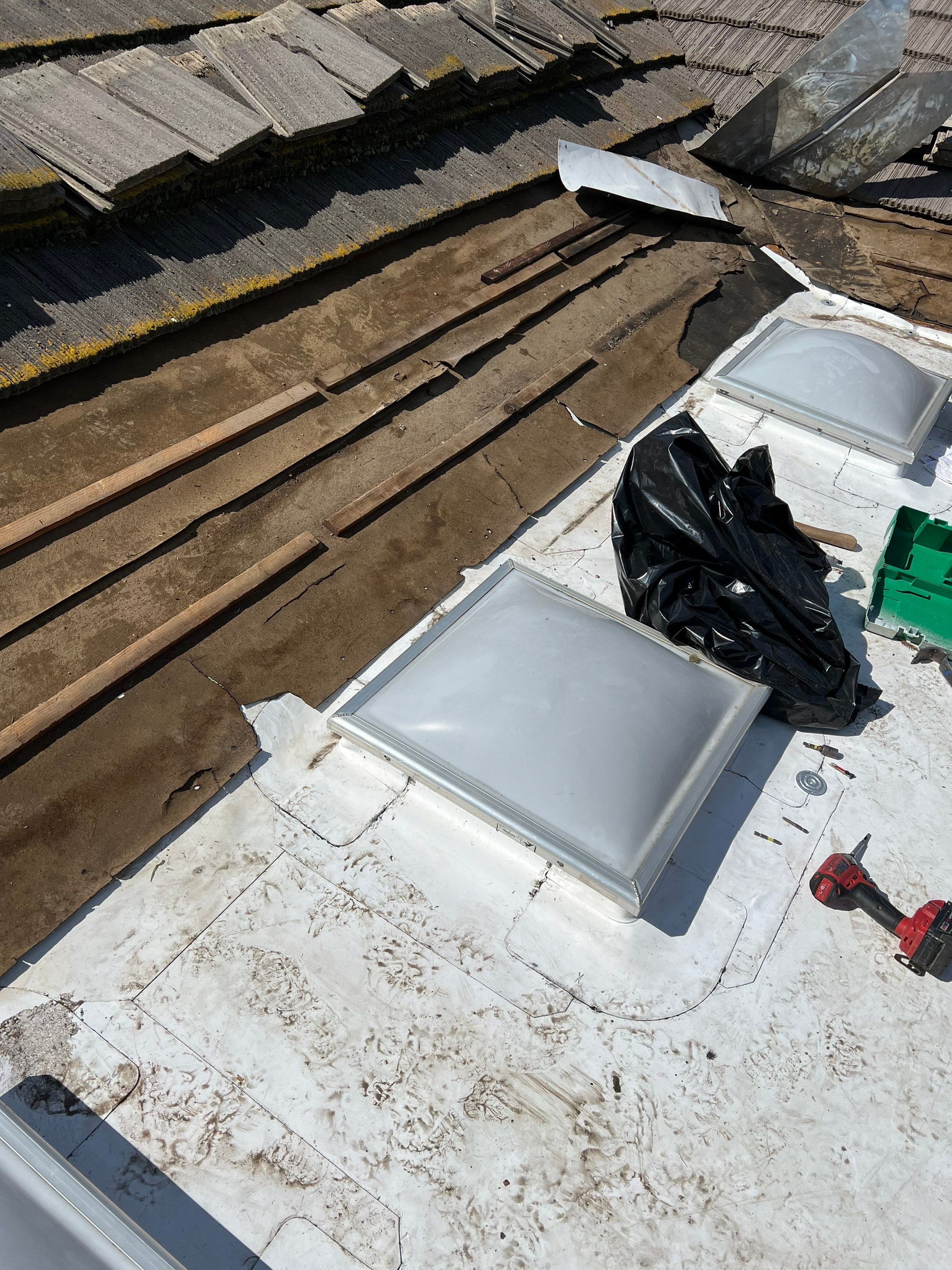 Single-ply roofing system on porch using TPO 60 mil by Straight Edge Roofing Inc