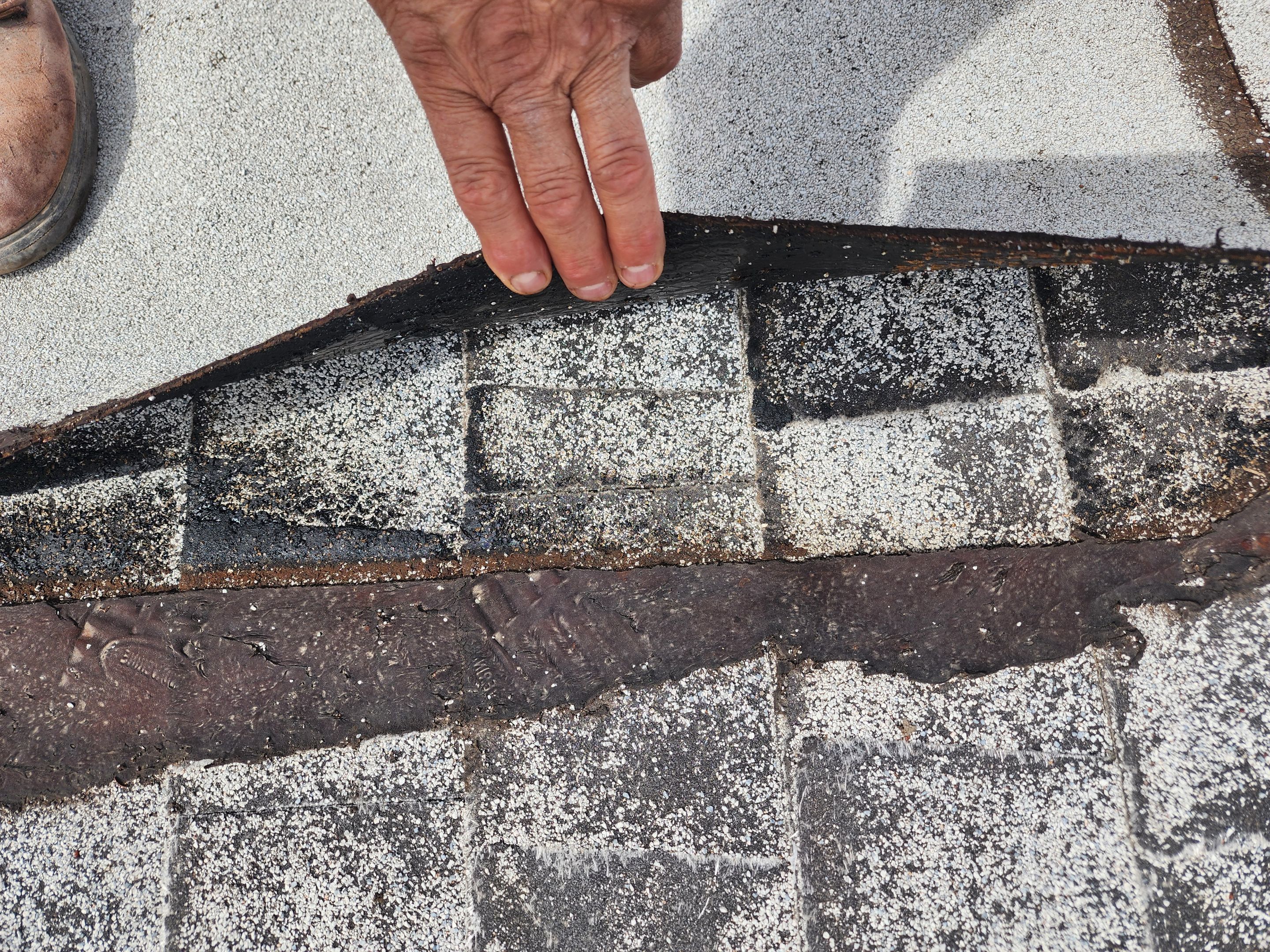 Foam and coatings on commercial roof by Straight Edge Roofing Inc