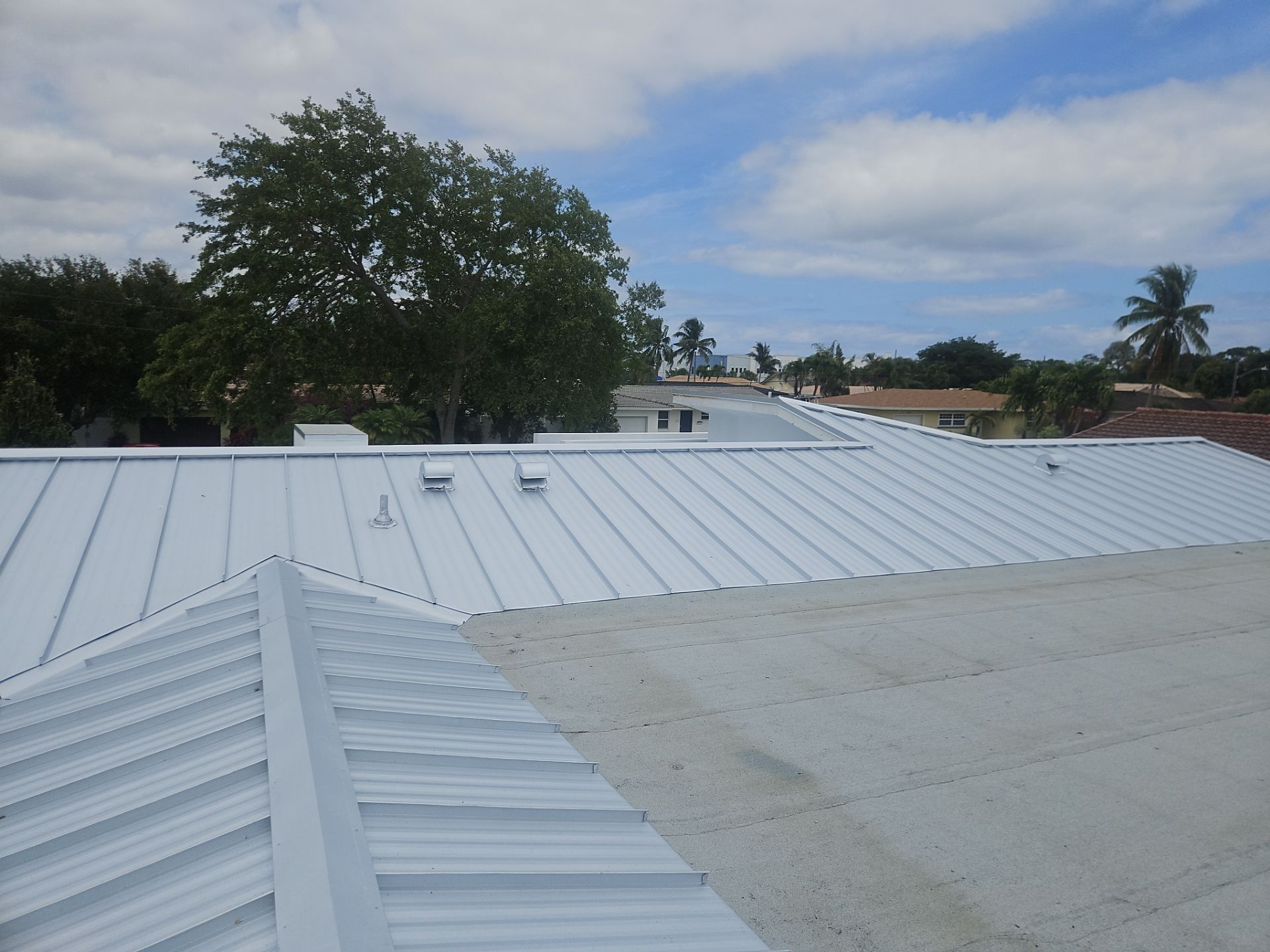 Residential Roofing Installation using 1" Nail strip metal roof by BLUES BROTHERS CONSTRUCTION CORP