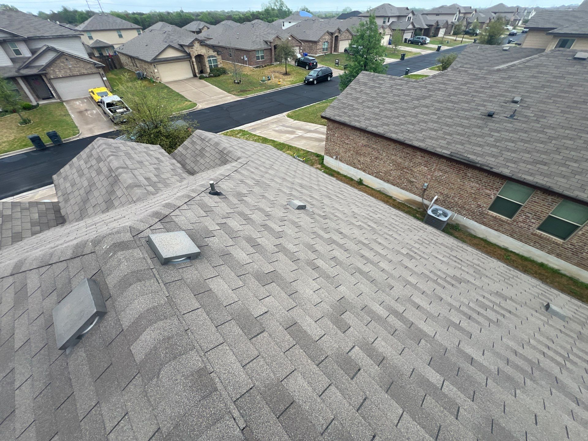 Residential Roofing Installation using IKO Nordic Class 4 Impact Resistant 30yr Architectural Shingles. Color: Castle Grey by WR Roofing Solutions