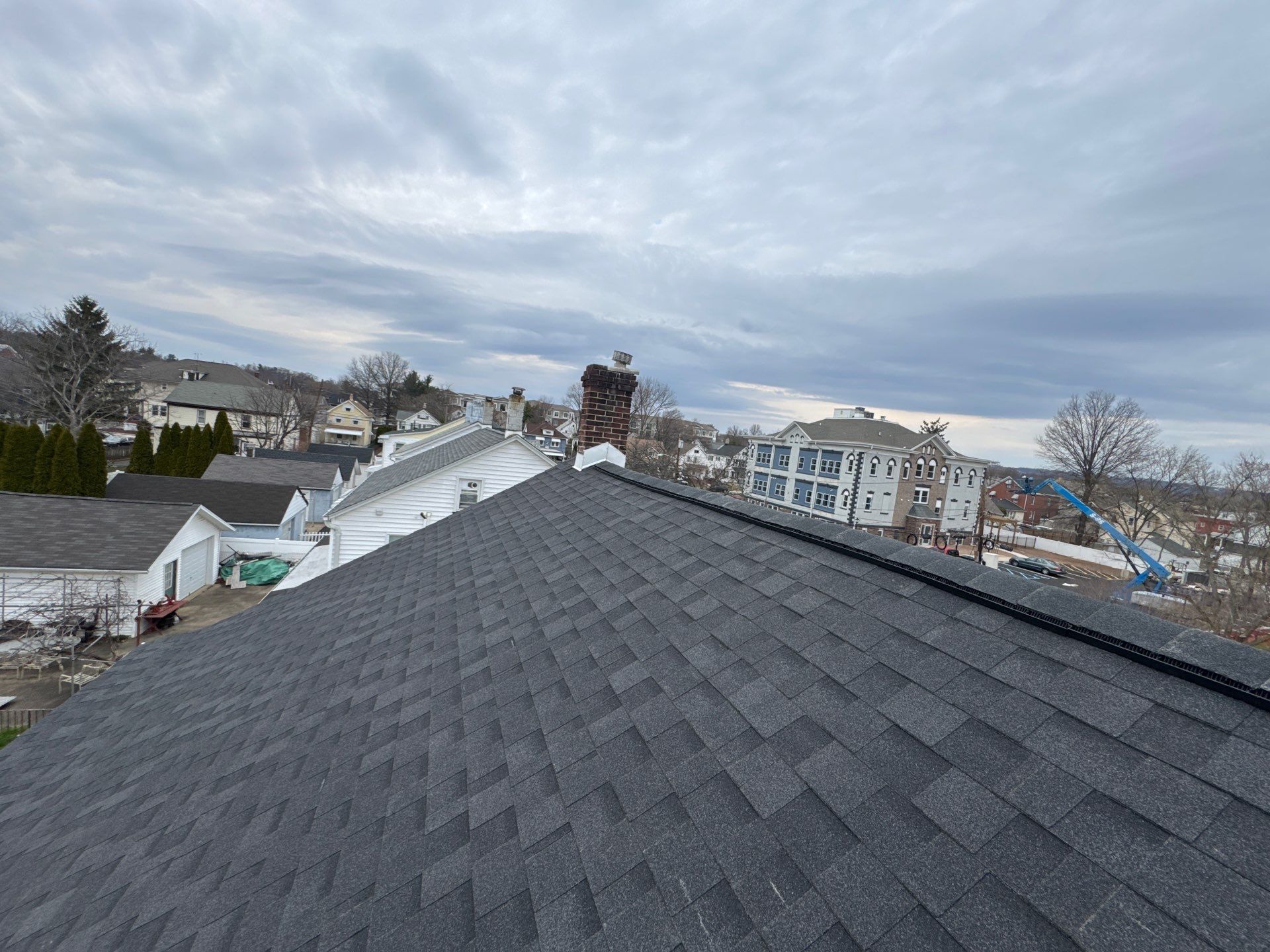 Onyx Black Shingles by Reimagine Roofing