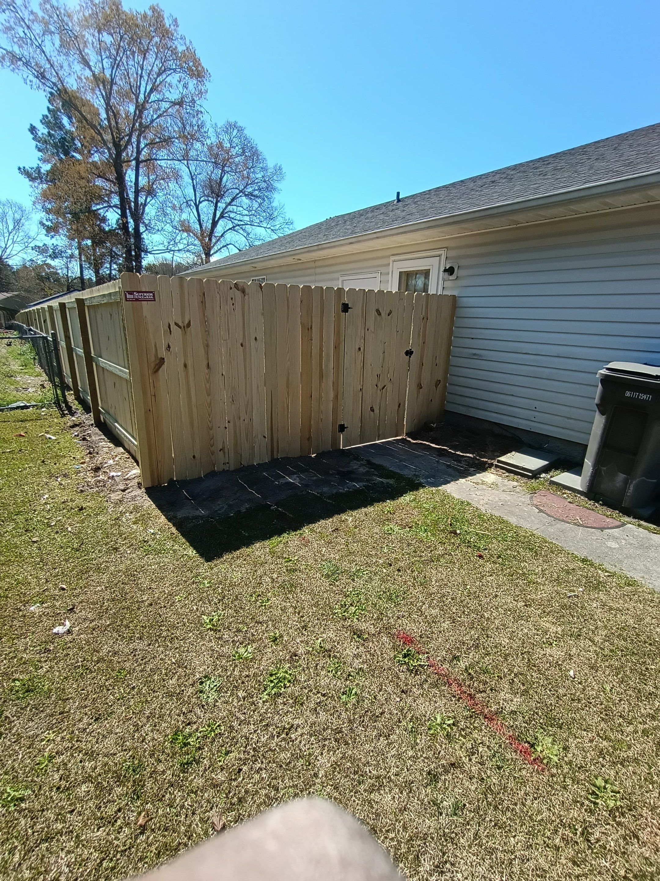 Wood Privacy Fence Installation in Hubert, NC by Superior Fence and Rail