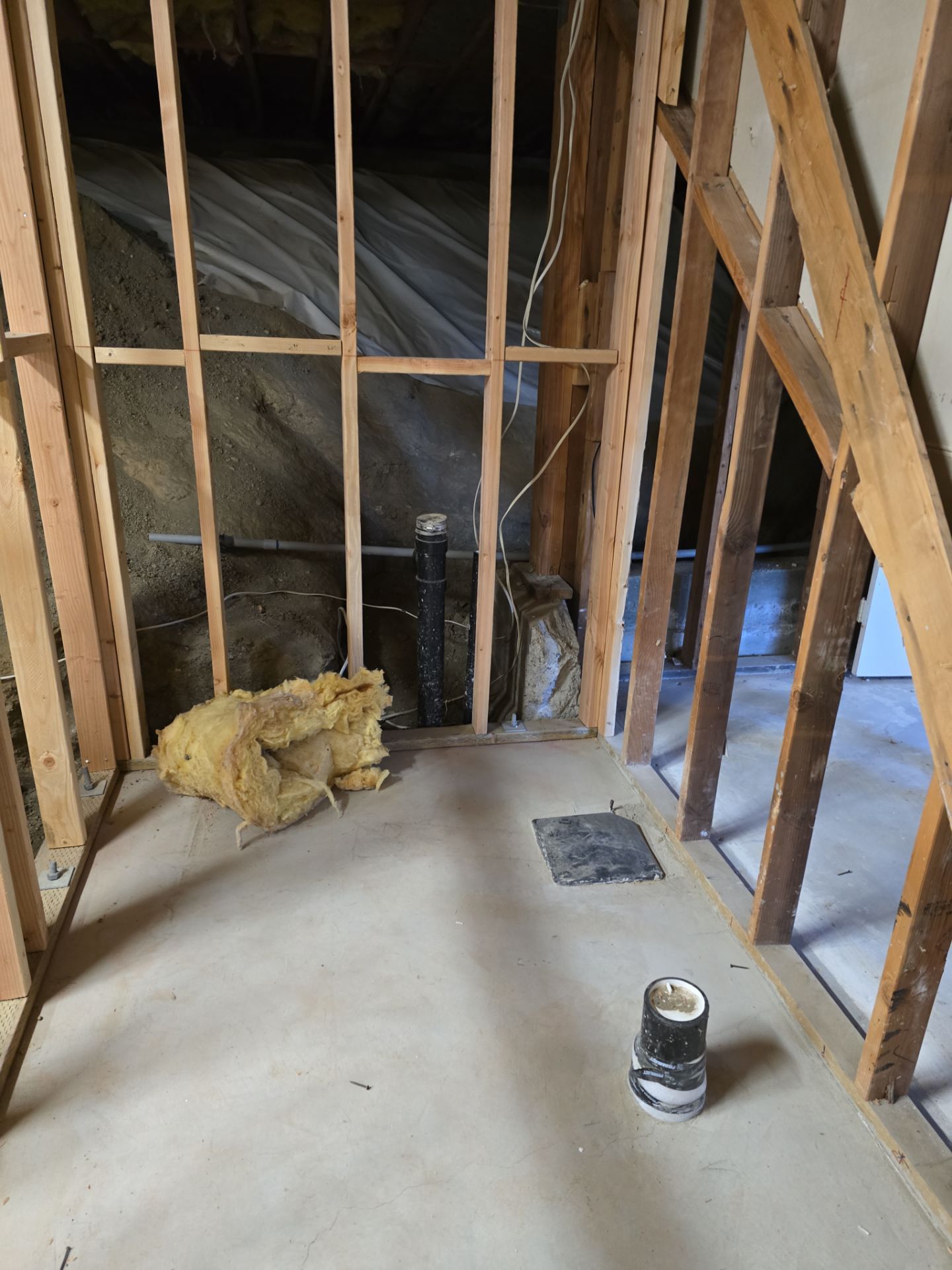 Installation of Vertical Black Piping by Us Plumbing