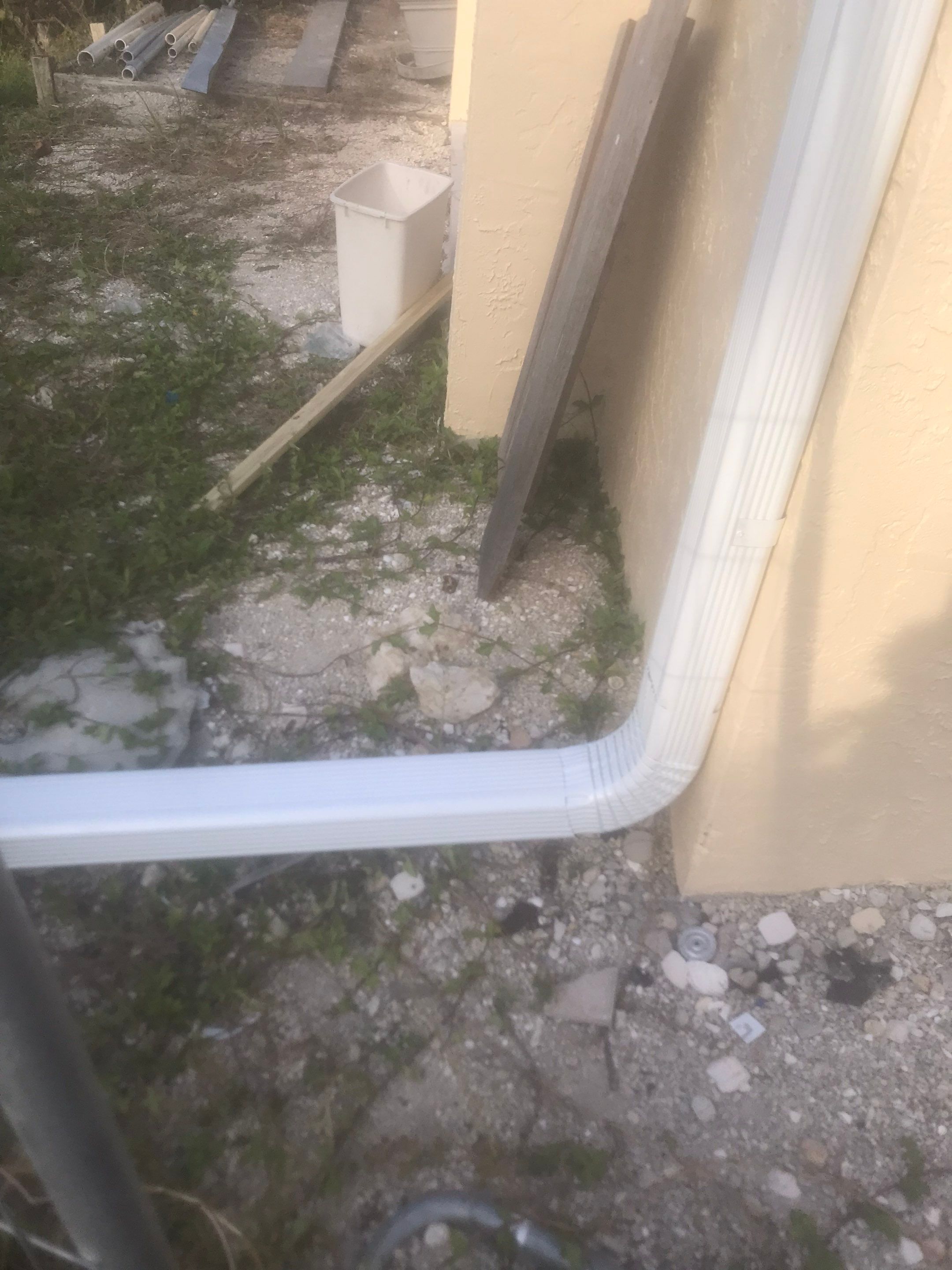 K-Style Seamless Gutter Installation using White Seamless Gutters in Sanibel FL by Gutter Professors