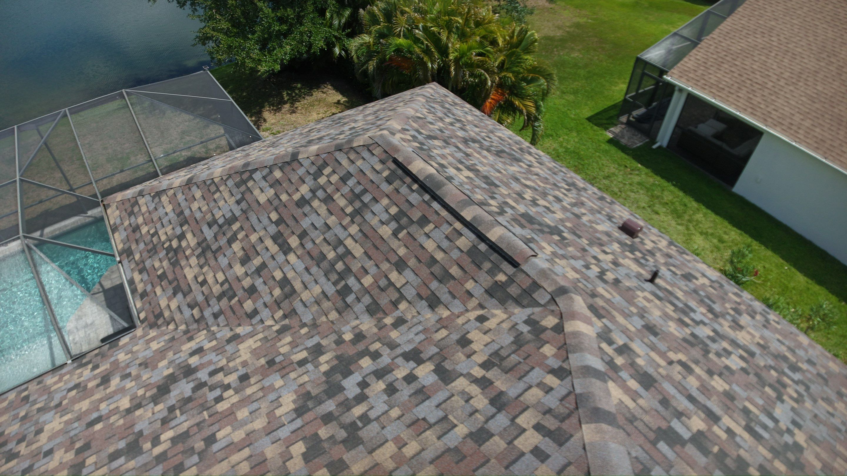Architectural Summer Harvest Asphalt Shingle Roof Replacement in Bradenton, Florida by Trinity Restoration and Roofing LLC