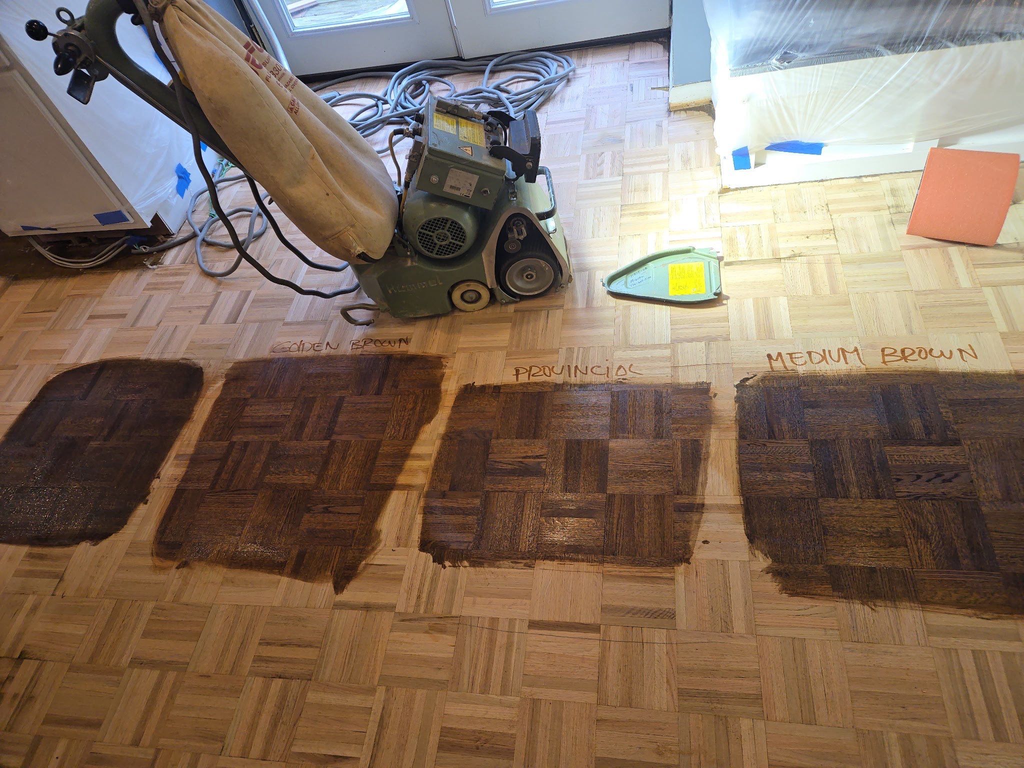 Parquet floor and stair treads by Footprints Floors of Nashville