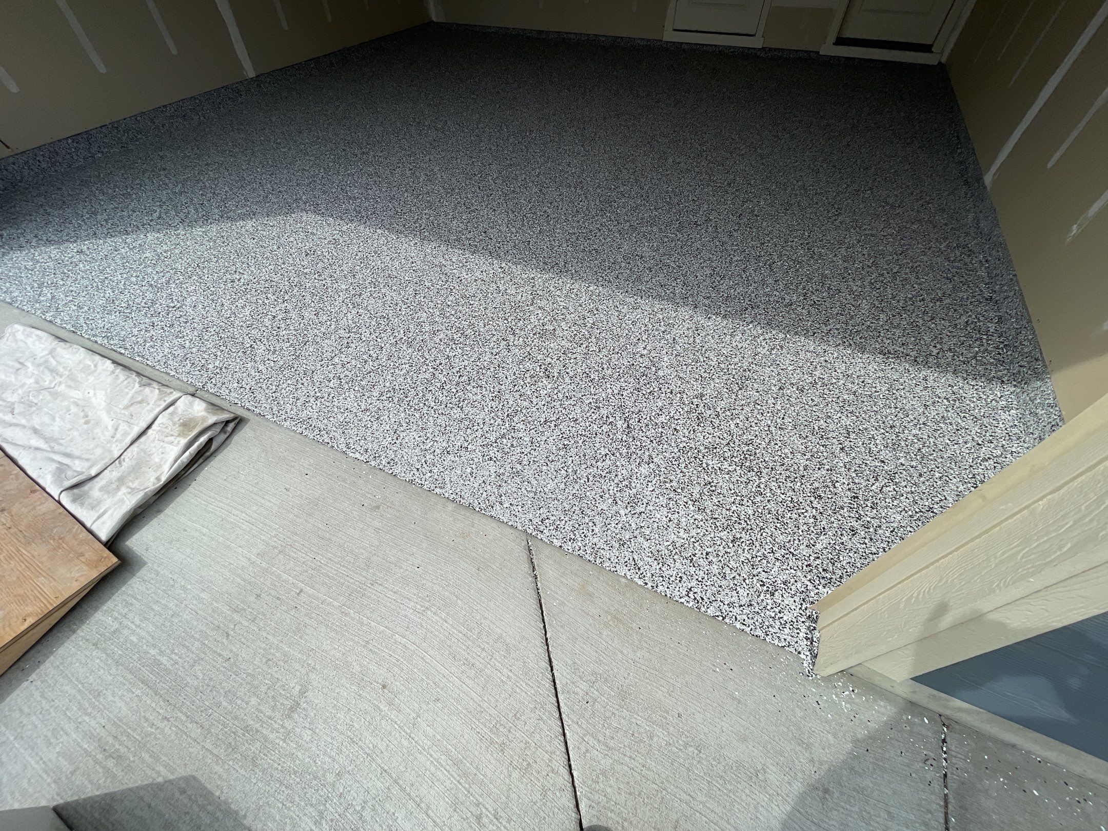 Garage Transformation using Domino by Croc Coatings, LLC