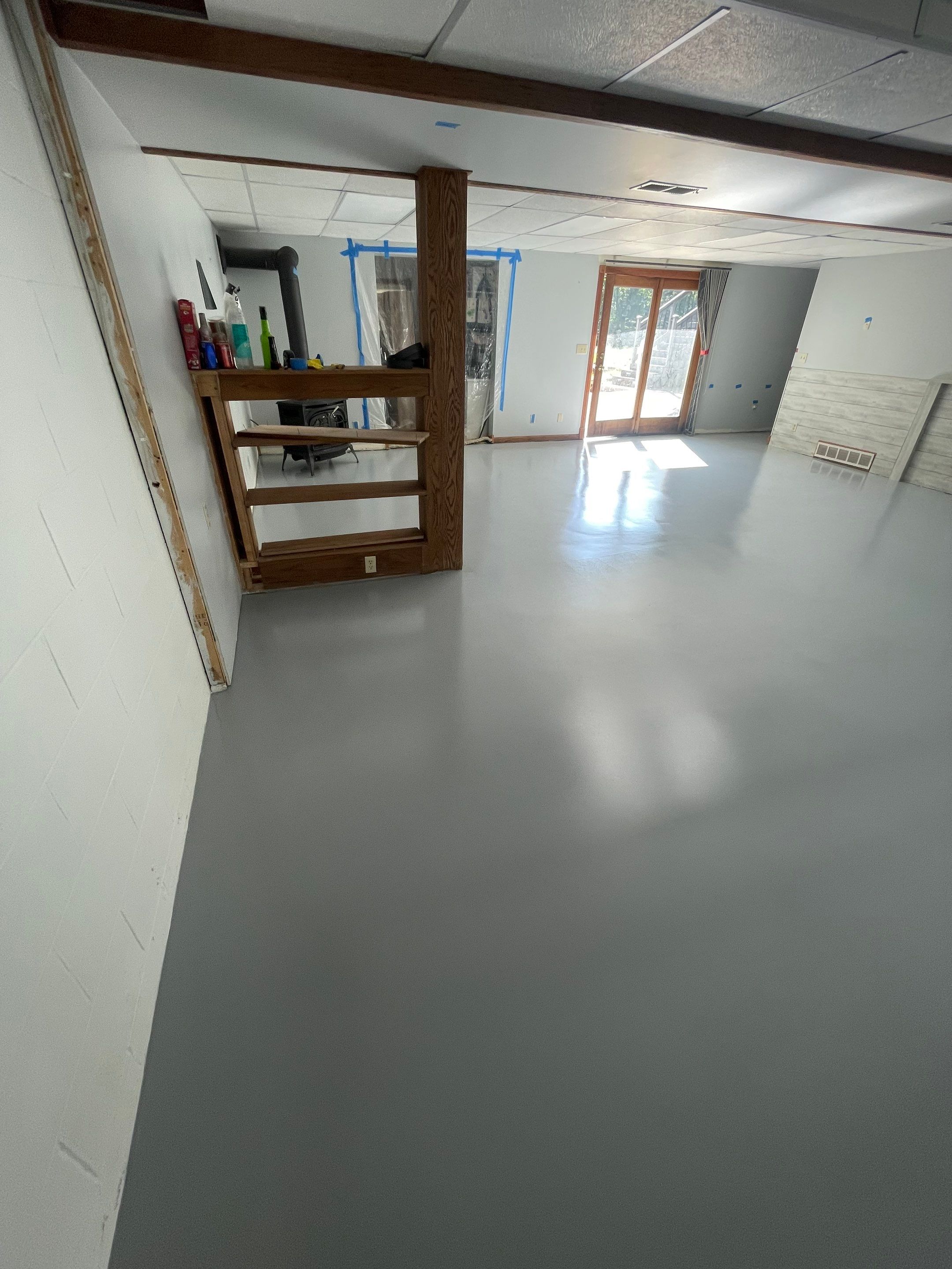 Solid Color Concrete Floor Coating for Renner Basement by Select Painting, Coatings & Garage Cabinets