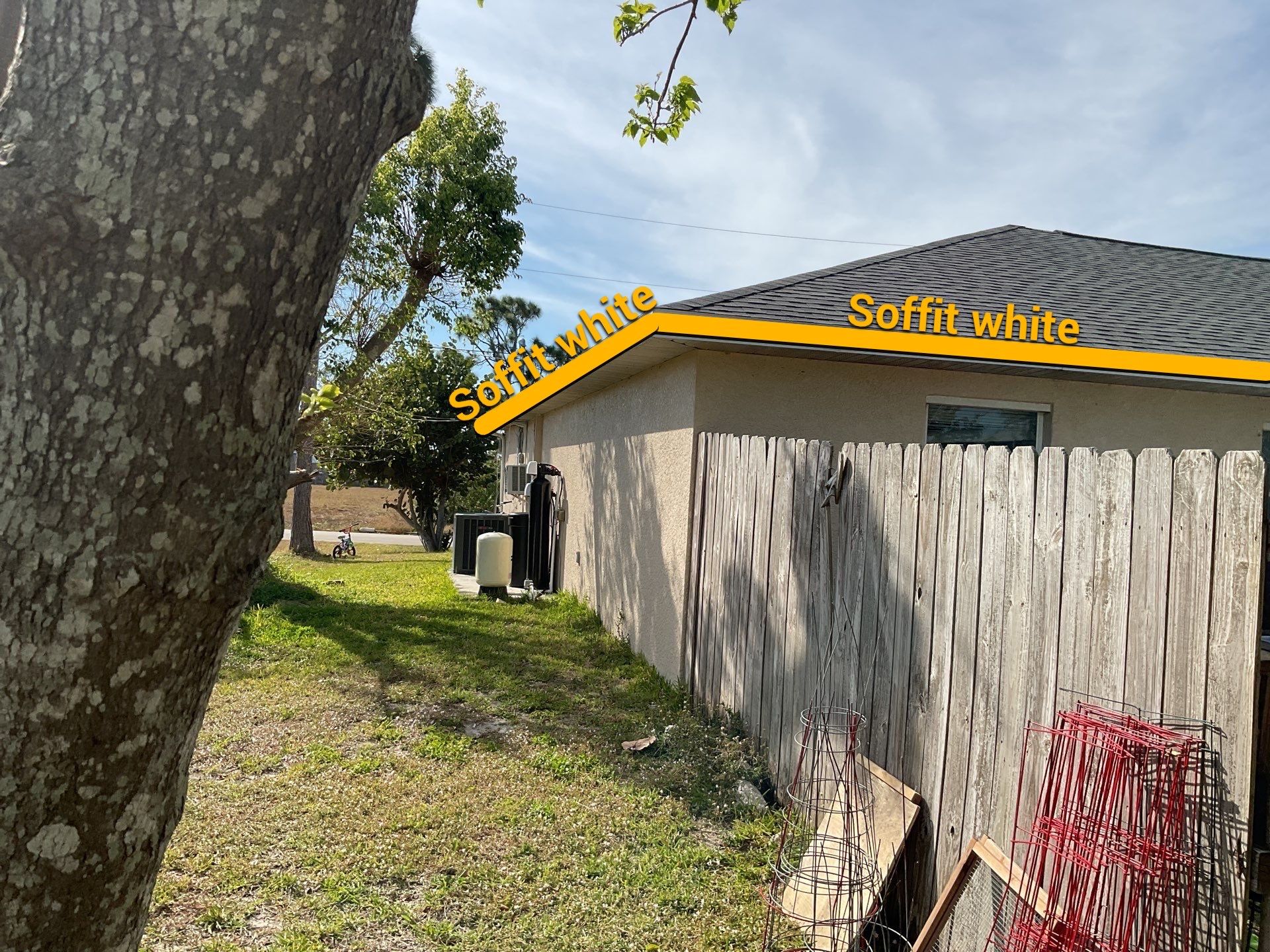 White Seamless Gutters and Soffit Installation in Cape Coral FL by Gutter Professors