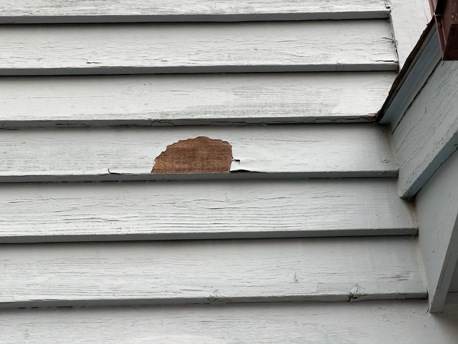 Full Exterior Home Painting and Siding Refurbishment in Sioux Falls by Select Painting, Coatings & Garage Cabinets