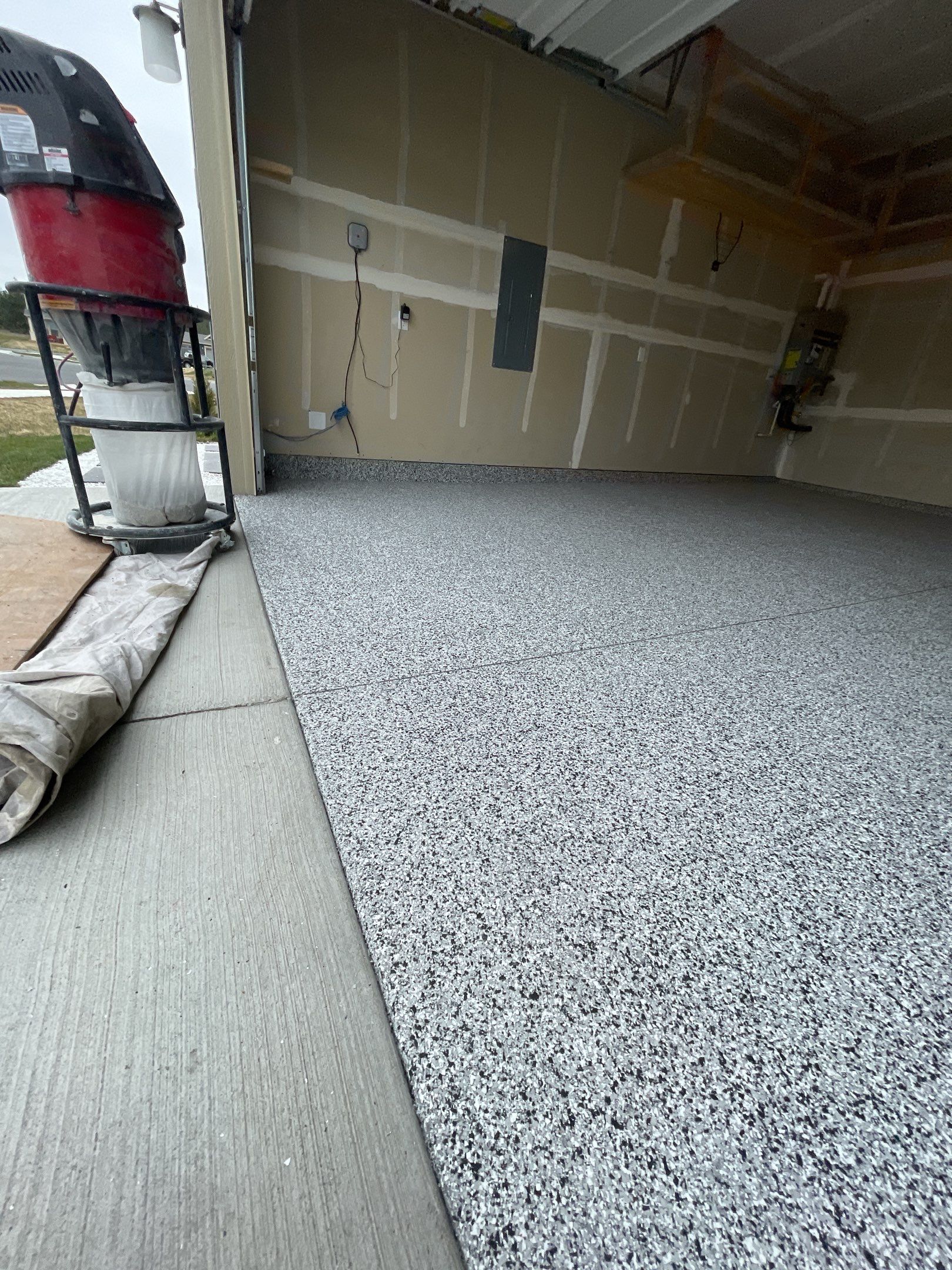 Garage Transformation using Domino by Croc Coatings, LLC