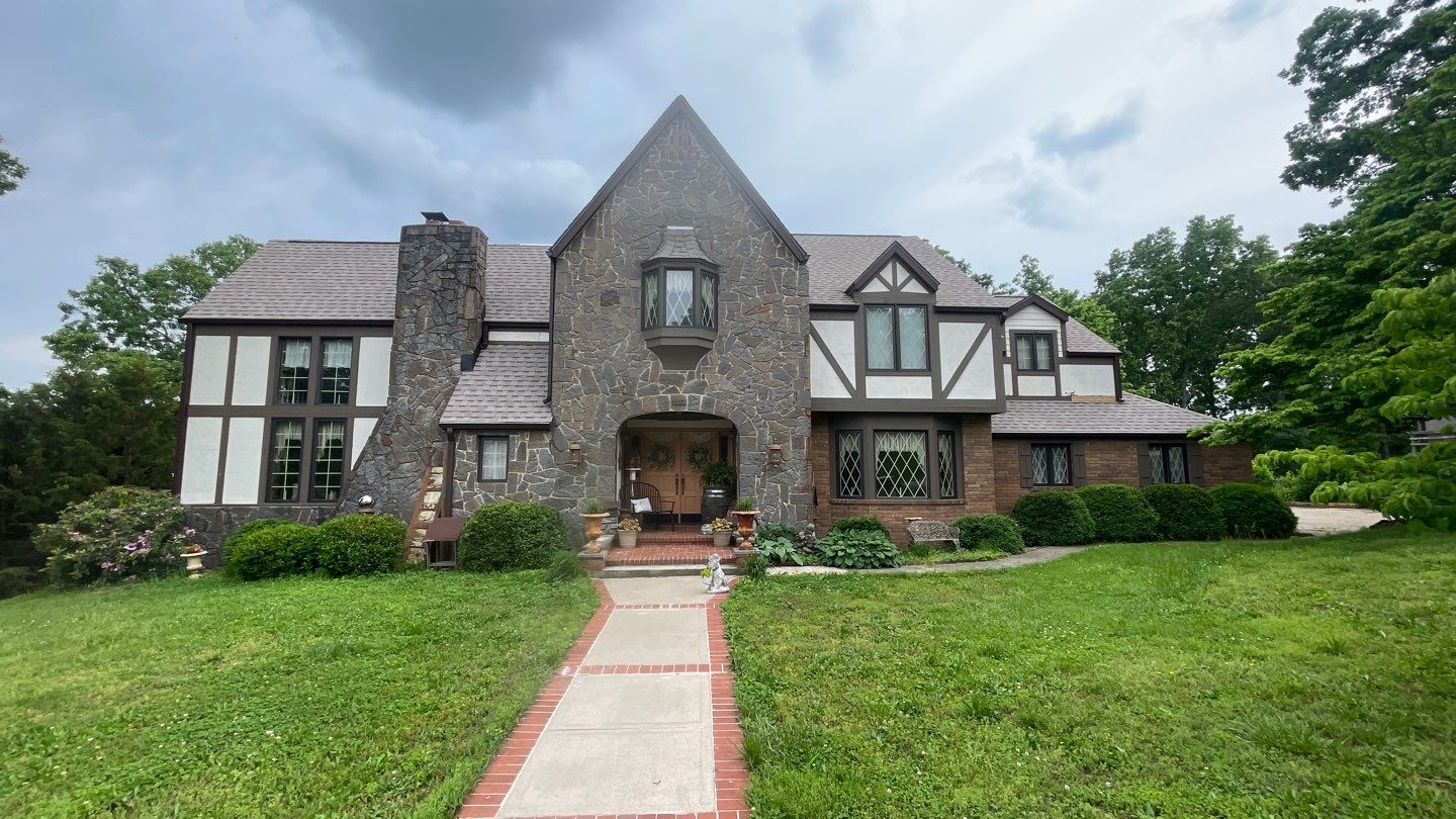 Residential Roof + Gutters & Downspouts & Gutter Guards Install  by Titan Commercial & Residential Roofing 