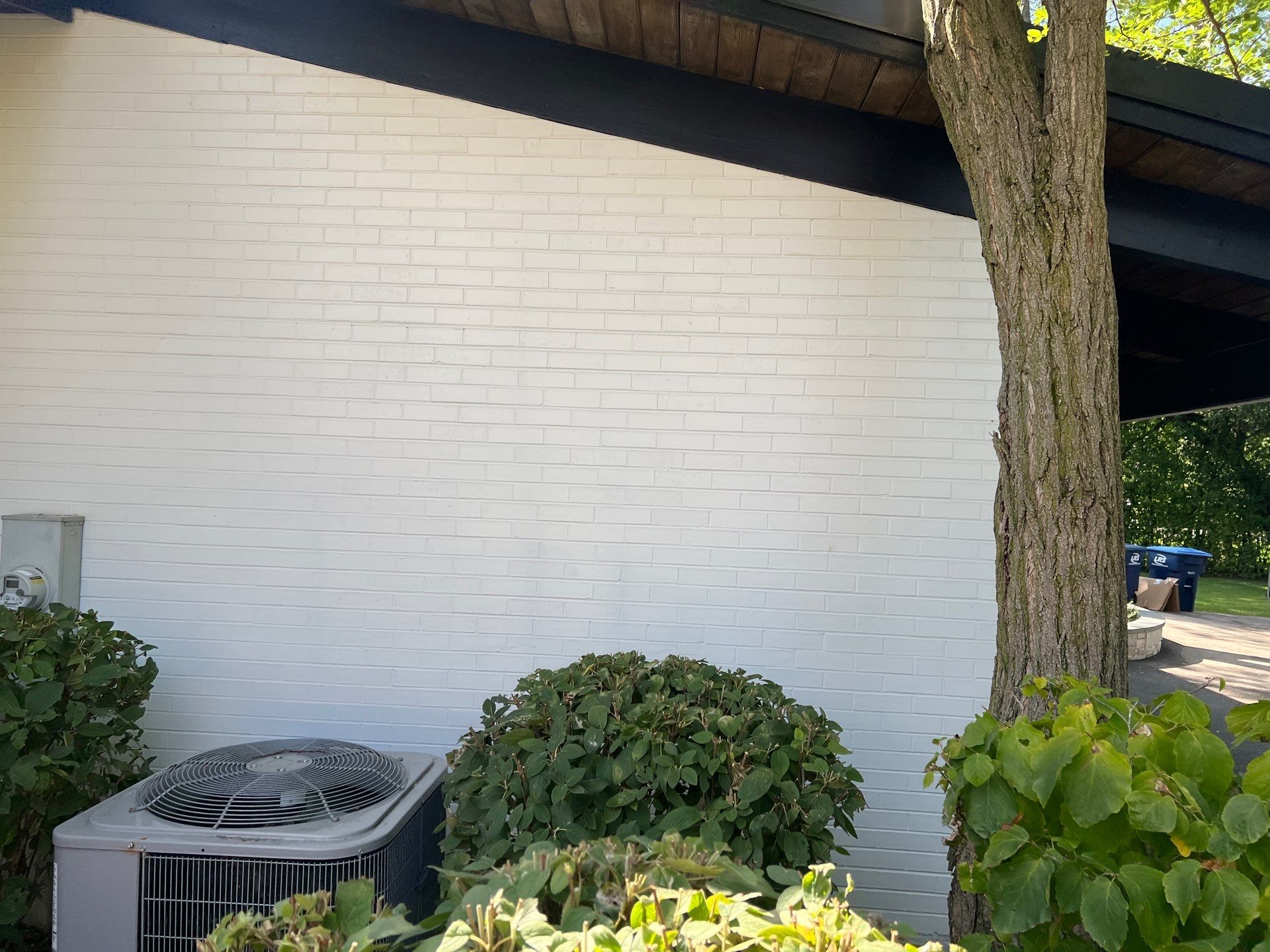 Complete Exterior House, Bluestone & Garage Floor Cleaning by Northern Power Washing LLC.
