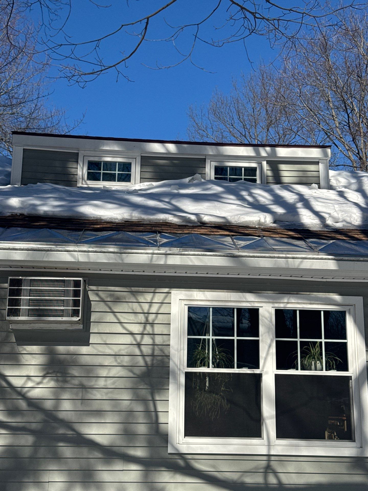 Snow/Ice Belt & Ice Dam Removal Project in Woburn by Mighty Dog Roofing of Greater Middlesex County