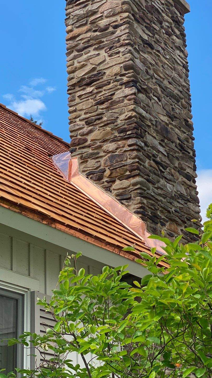 Cedar Shake Roof Replacement with Half Round Gutter Installation by Custom Installations