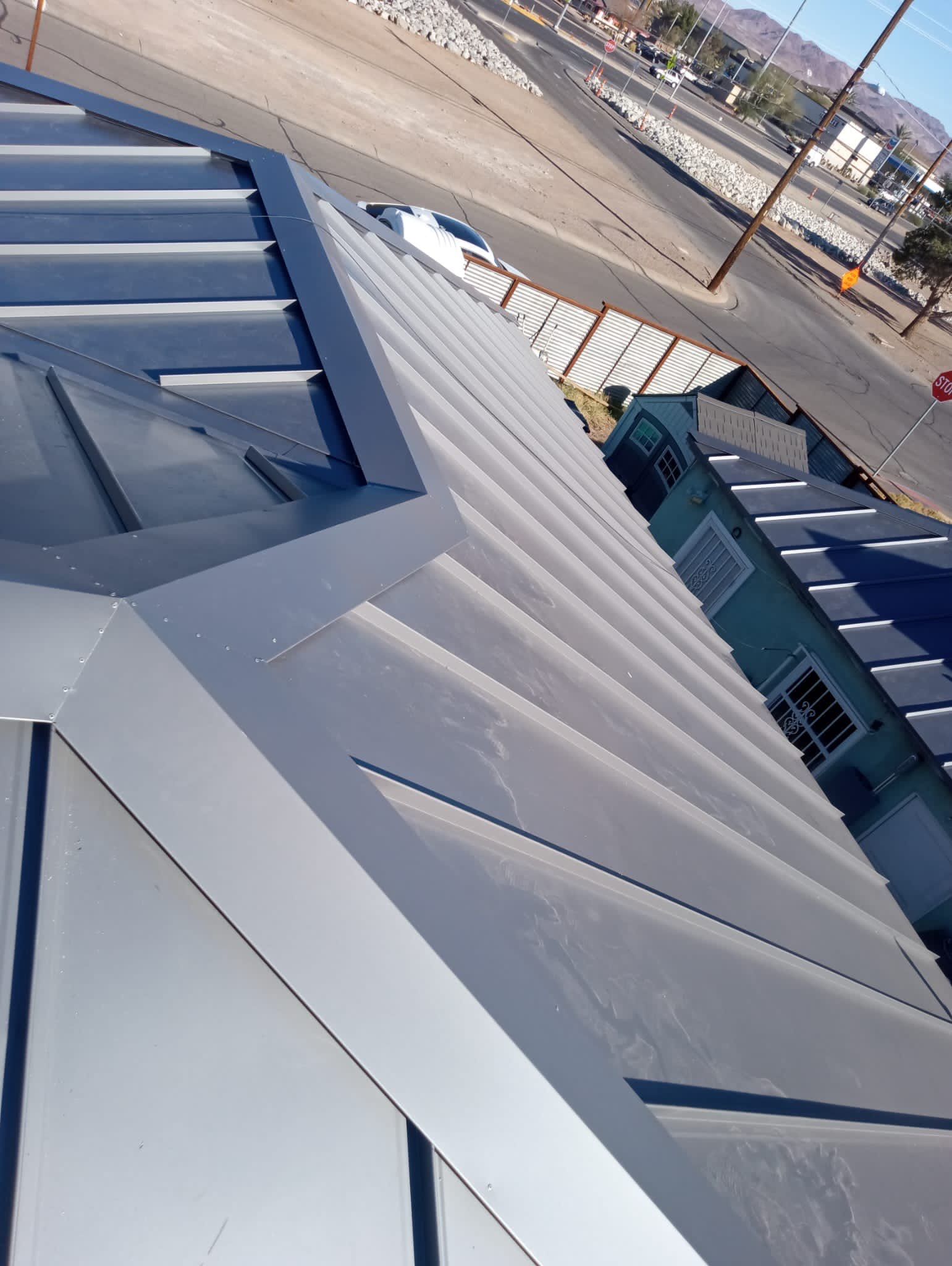 Charcoal Gray Standing Seam by Reimagine Roofing