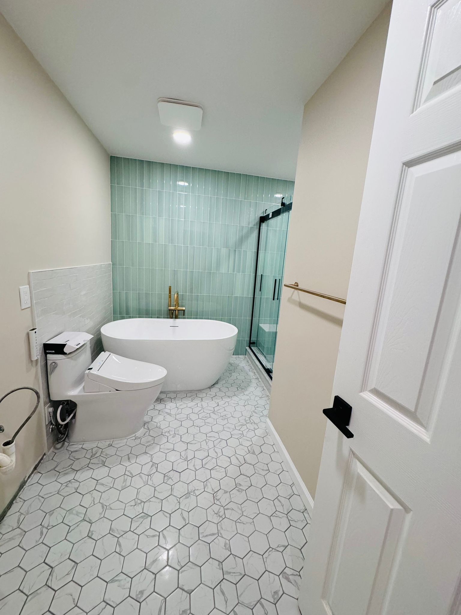 Bathroom Remodel using Tile by Home Concepts Construction