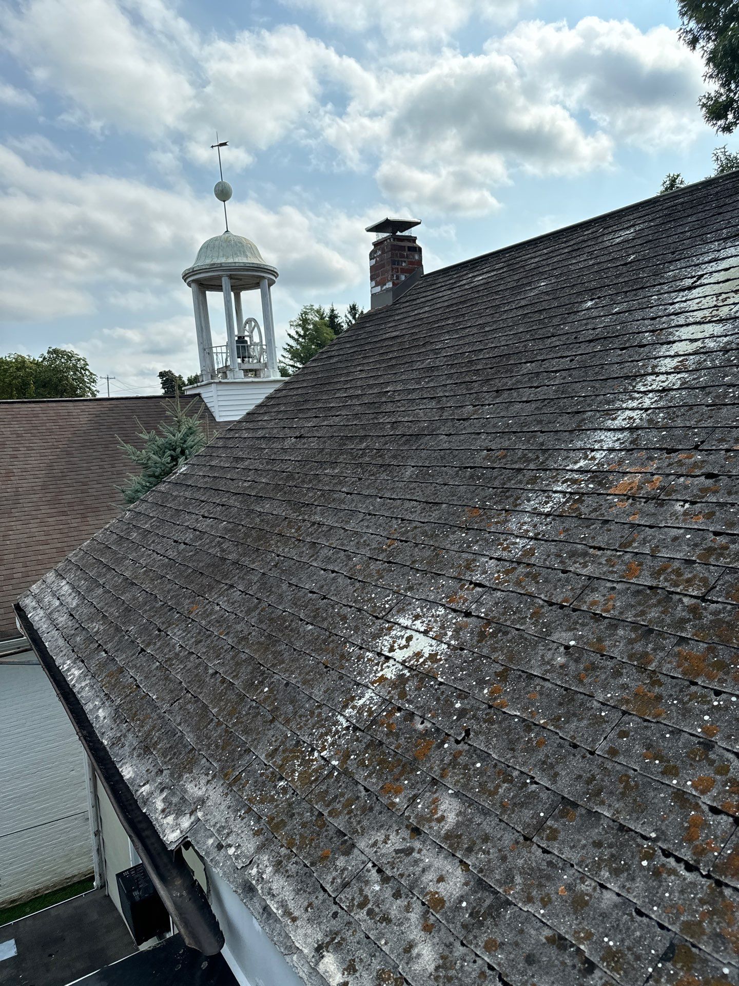 Textured Bronze Roof and Flat Membrane Installation in Hershey by Esh Builders