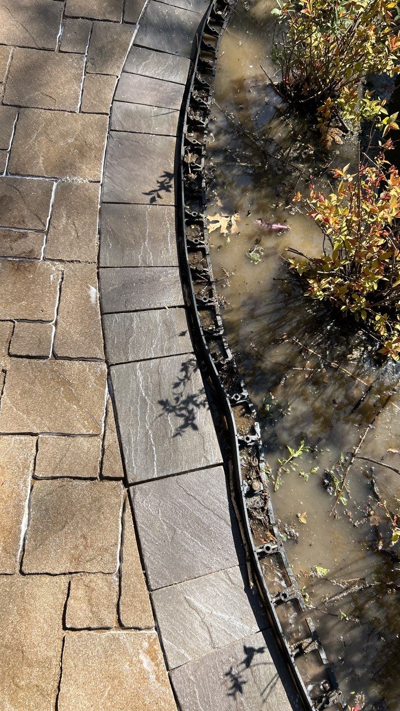 natural stone using Algaecide, soft wash soap by Northern Power Washing LLC.