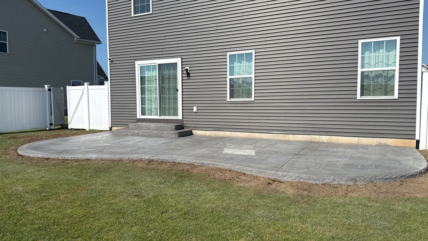Stamped English Rivenstone Concrete Patio  by NG Masonry & Construction LLC