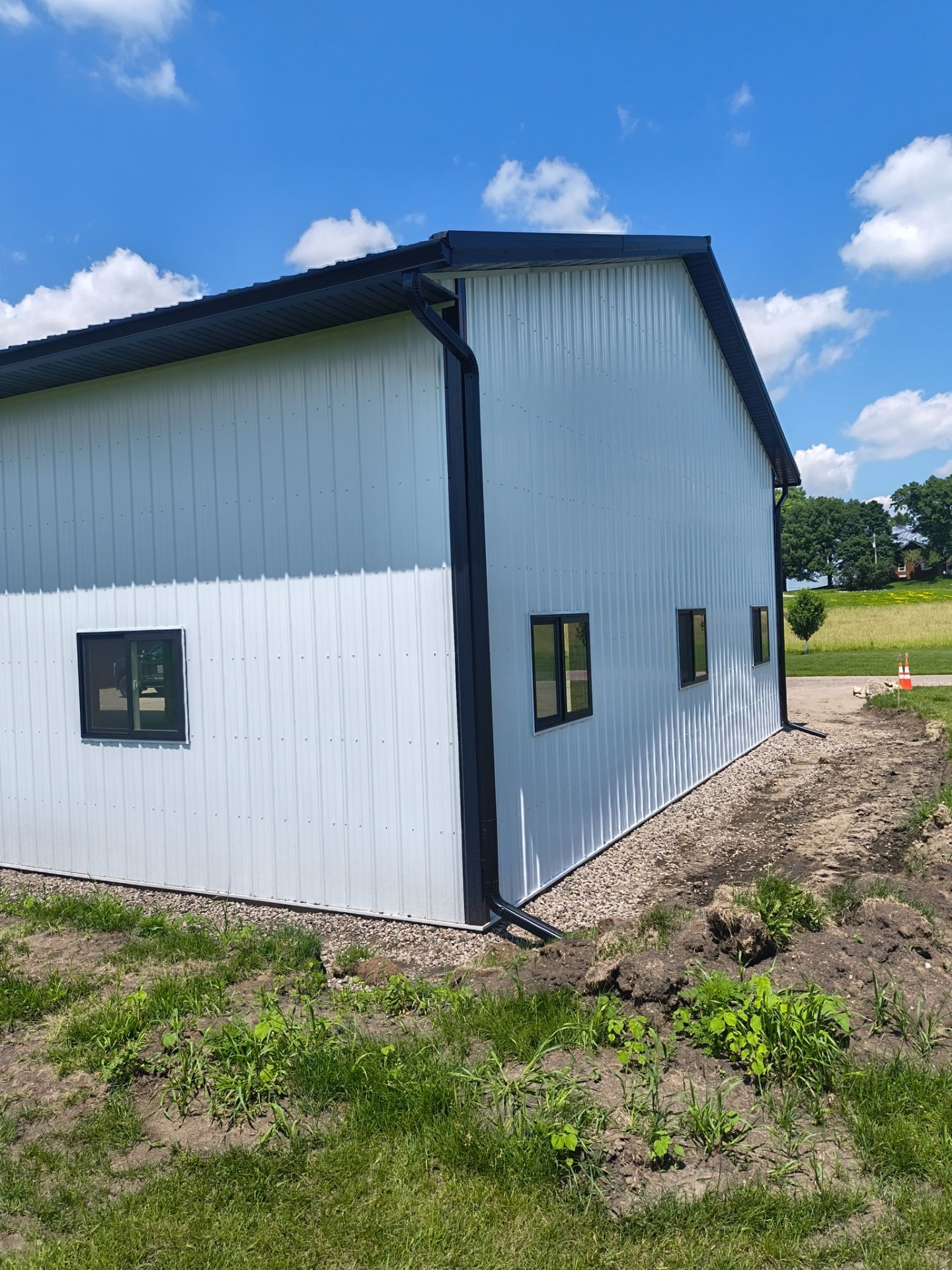 6" Black Seamless Gutters and Downspouts Loretto, MN  by Next Level Seamless Gutters / Exteriors Inc.