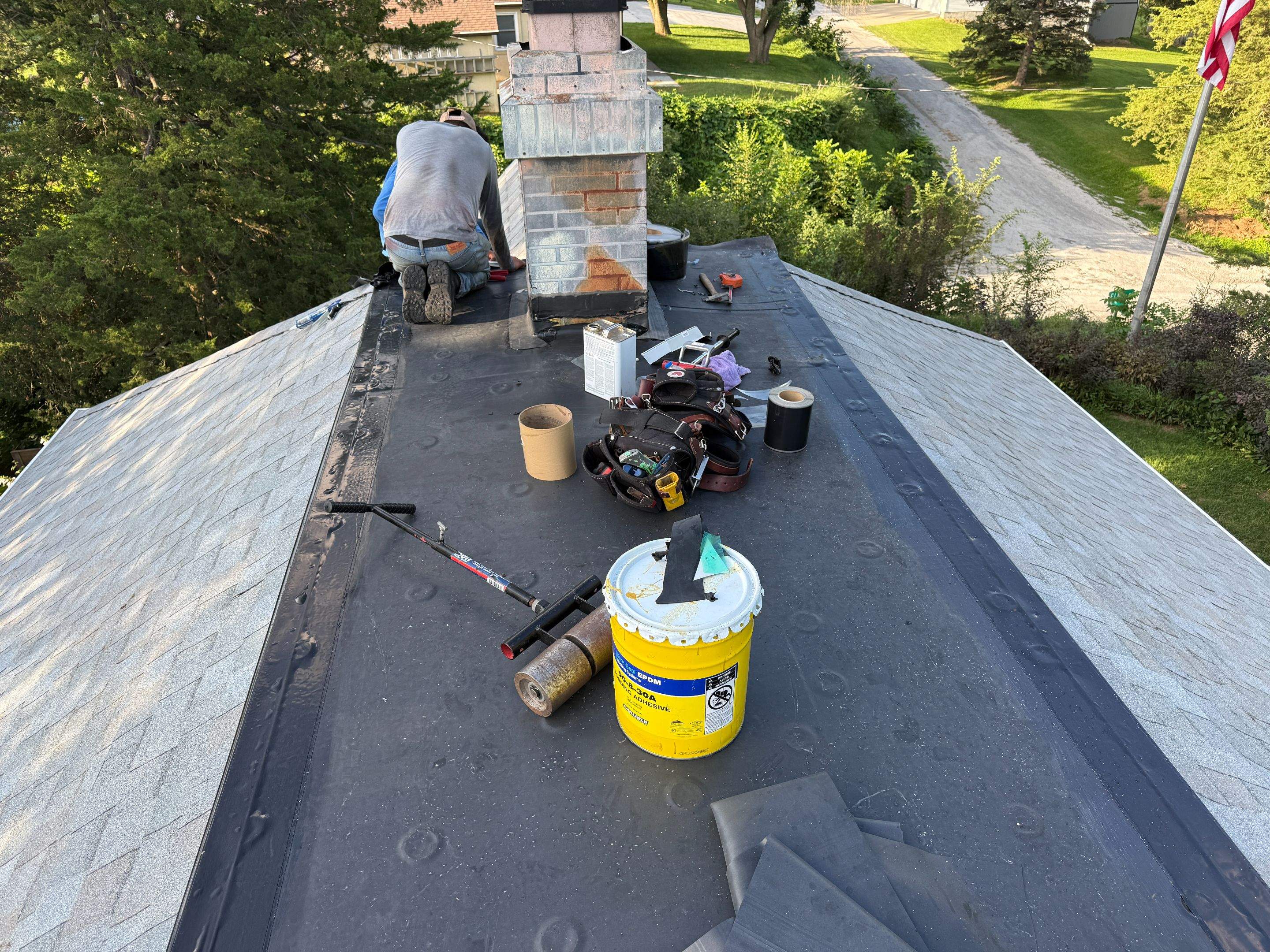 Asphalt Shingle and EPDM Membrane Roof Installation in Mineola by Star Home