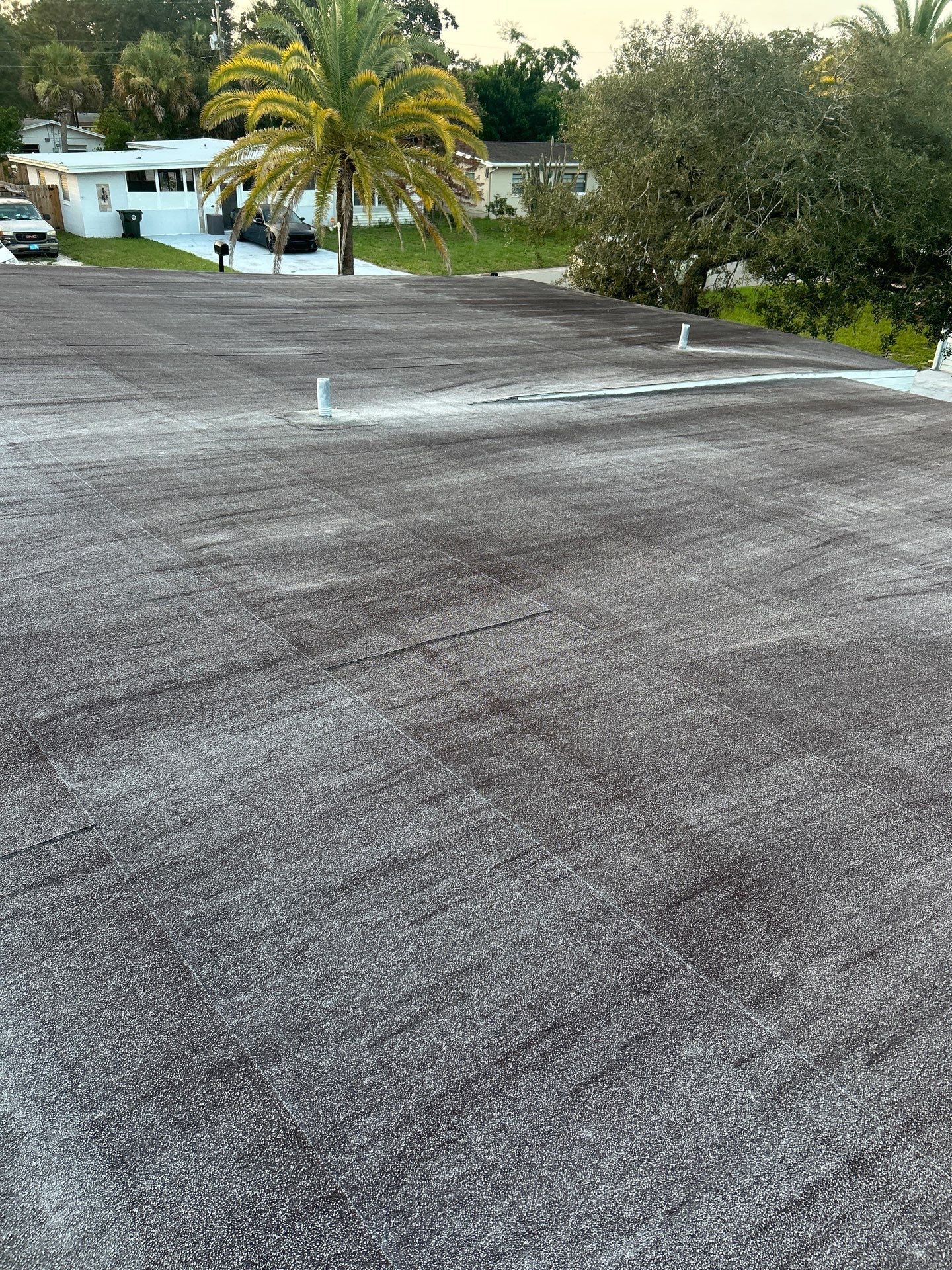 Colonial Slate Modified Bitumen Flat Roof Replacement in Daytona Beach by Pinnacle Roofing Group