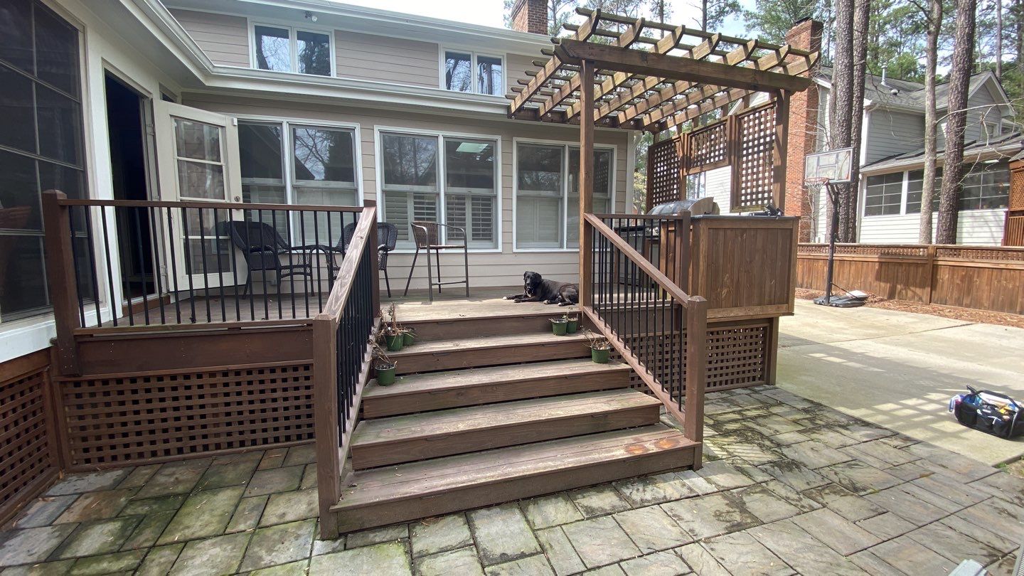Deck and Stamped Concrete Patio by DuraSeal