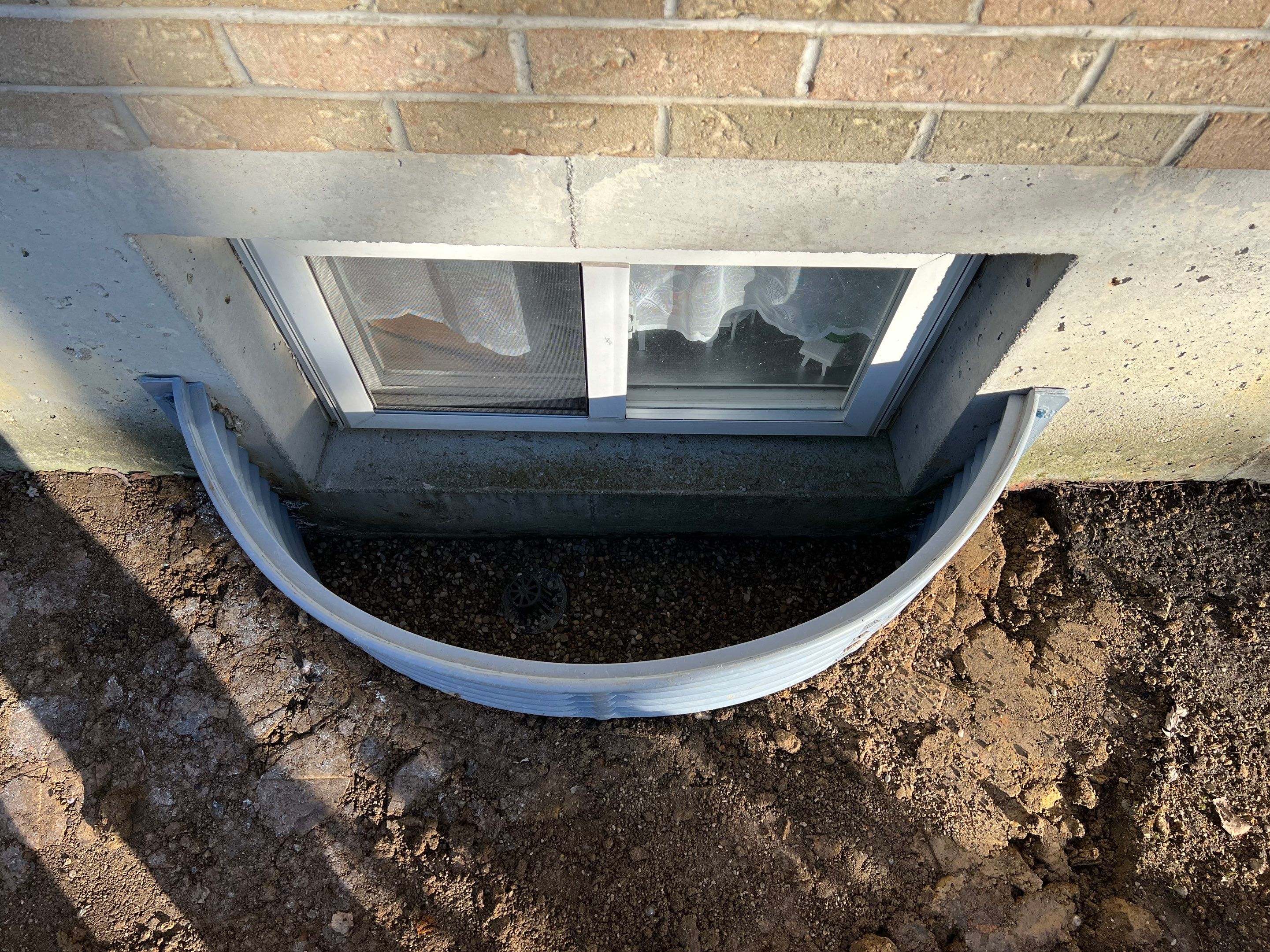 Window Well Replacement, Wall Repair, Grading by Reisenberg’s Lawn & Landscape, LLC