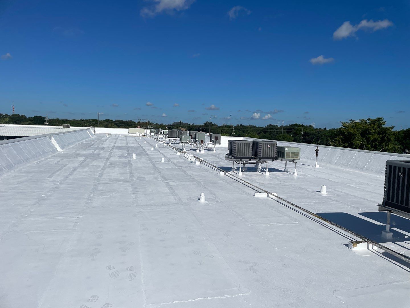 Commercial Flat Roof Waterproofing and Reflective Coating in Boca Raton by AJF ROOFING INC