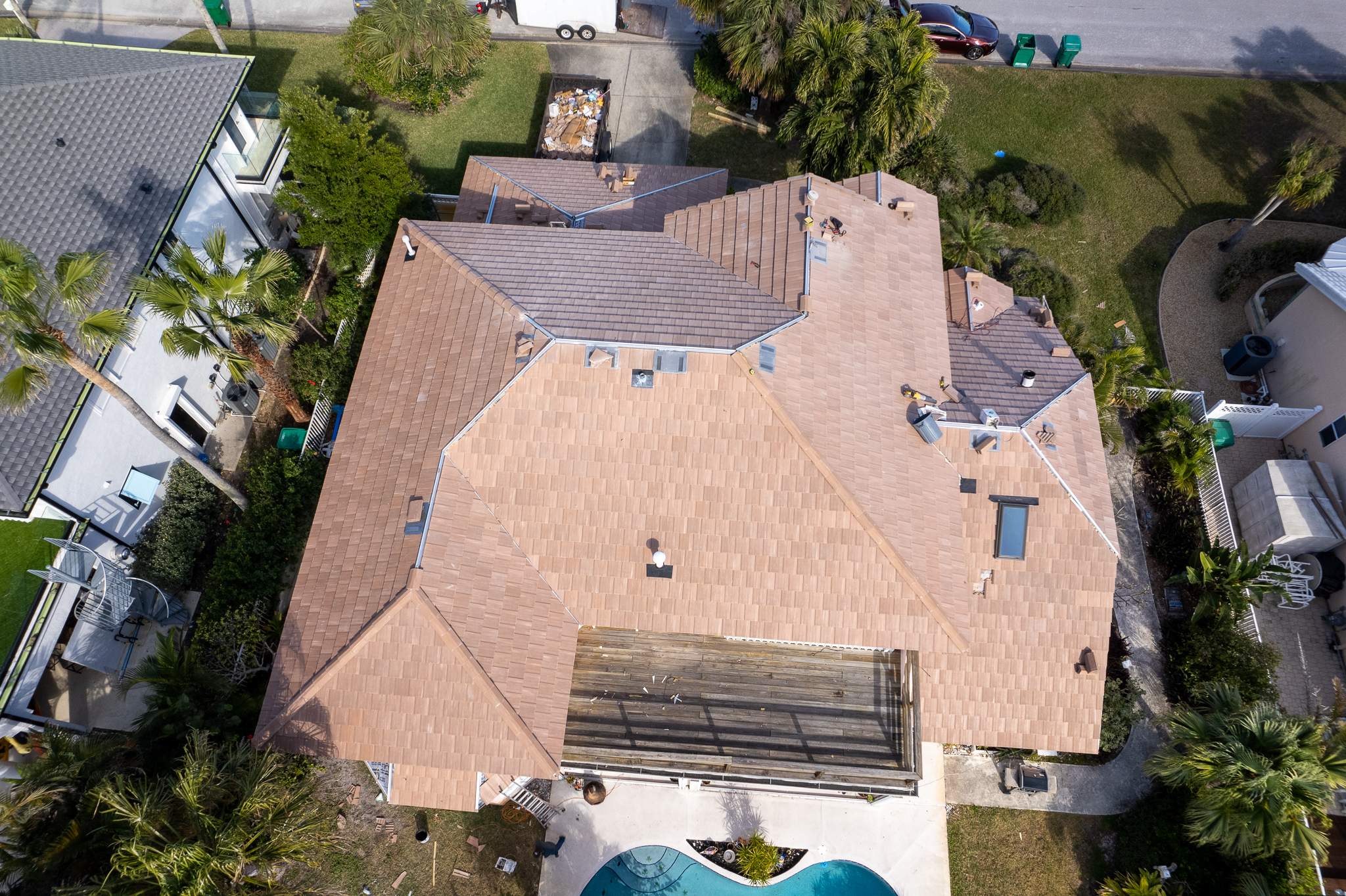 Full Clay Tile Roof Replacement and Deck Repair in Cocoa Beach, Florida by Wiedmann Construction & Roofing