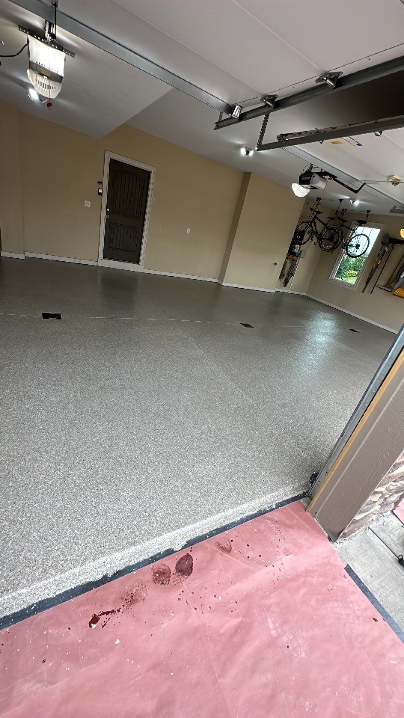 Large Patio + Garage Project in Moon Township by Floors in a Day, Inc