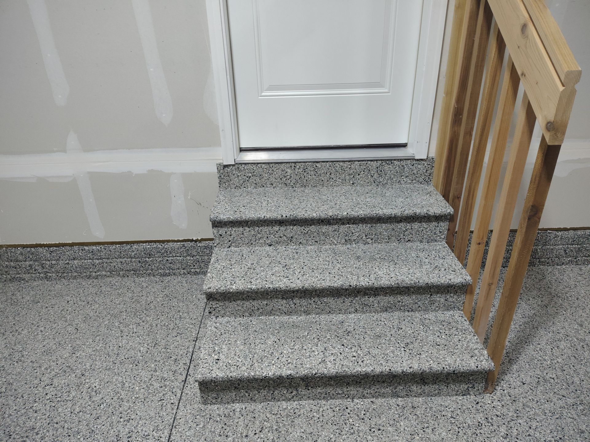 Adel, IA Garage: Complete Keystone Wrap on Floors, Stairs, and Stem Walls by Revival Concrete Coatings