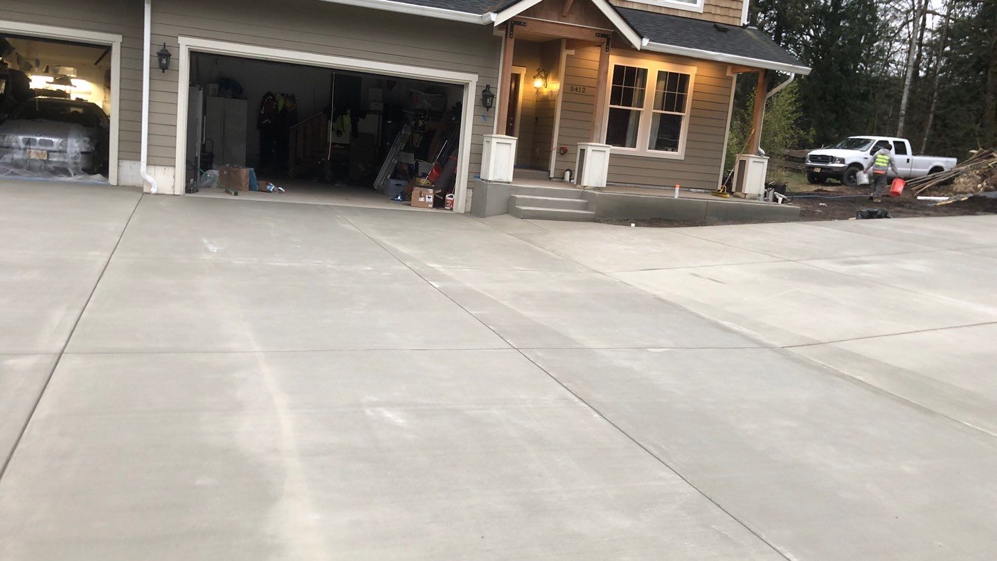 Mandy | Stamped Concrete Patio & Driveway by Jireh Asphalt & Concrete Inc 