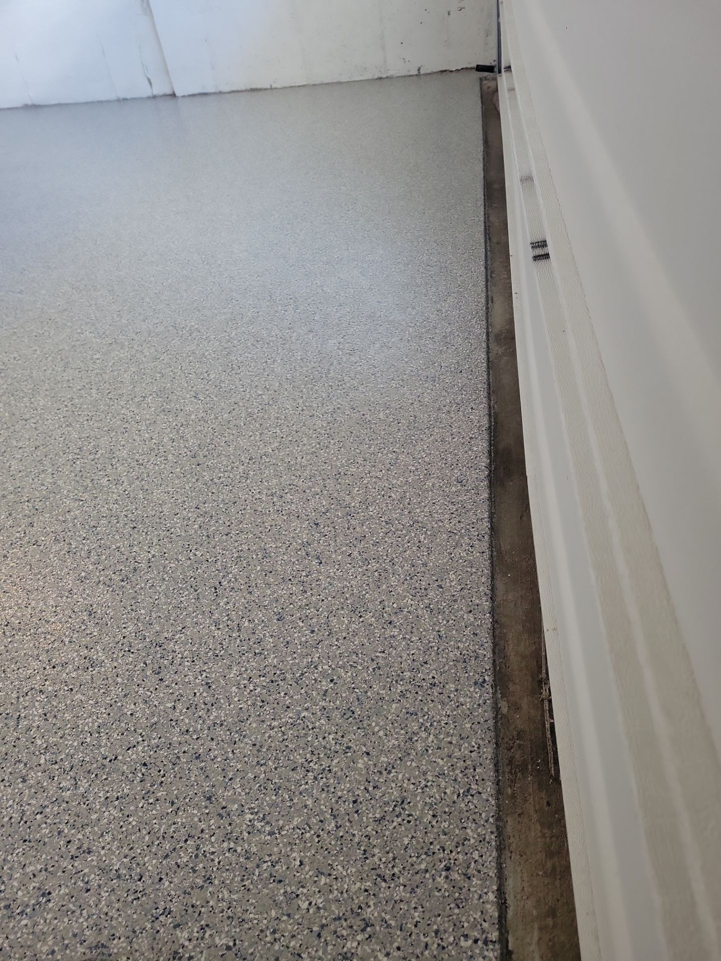 Garage Floor Coating using Penntek by Spectrum Painting, LLC