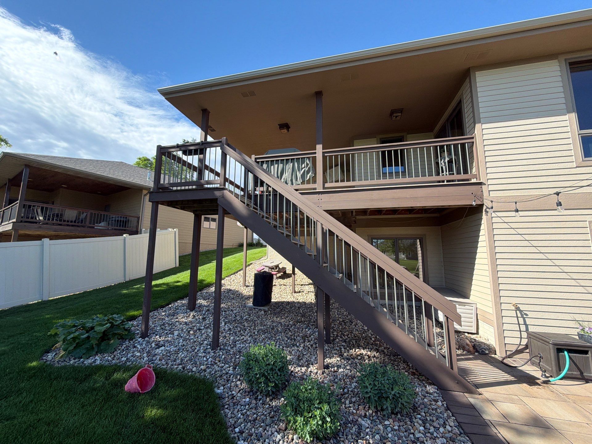 Sioux Falls Exterior Refresh and Multi-Level Deck Maintenance by Select Painting, Coatings & Garage Cabinets