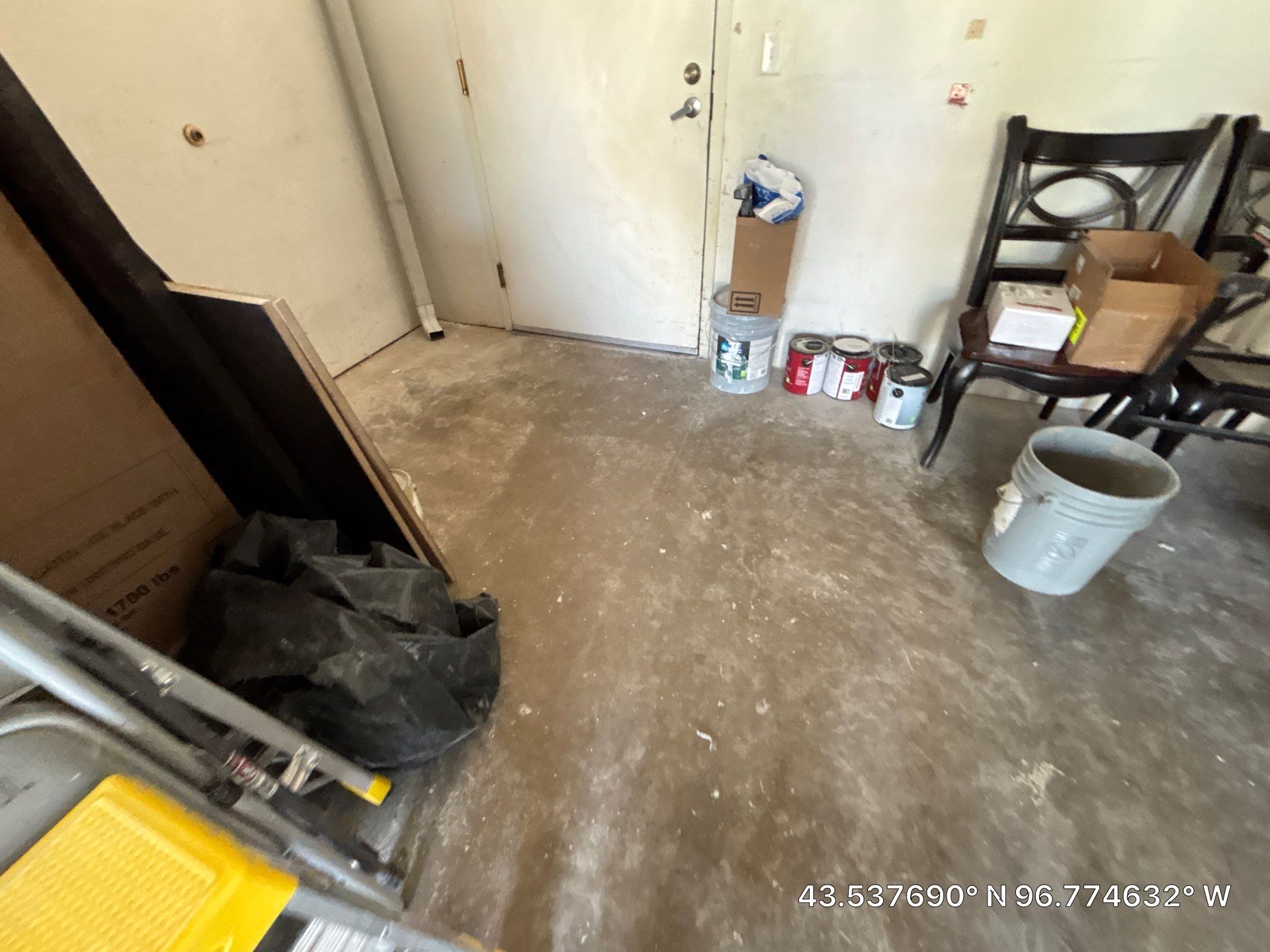 Coyote Flake Concrete Coating for Sioux Falls Garage by Select Painting, Coatings & Garage Cabinets