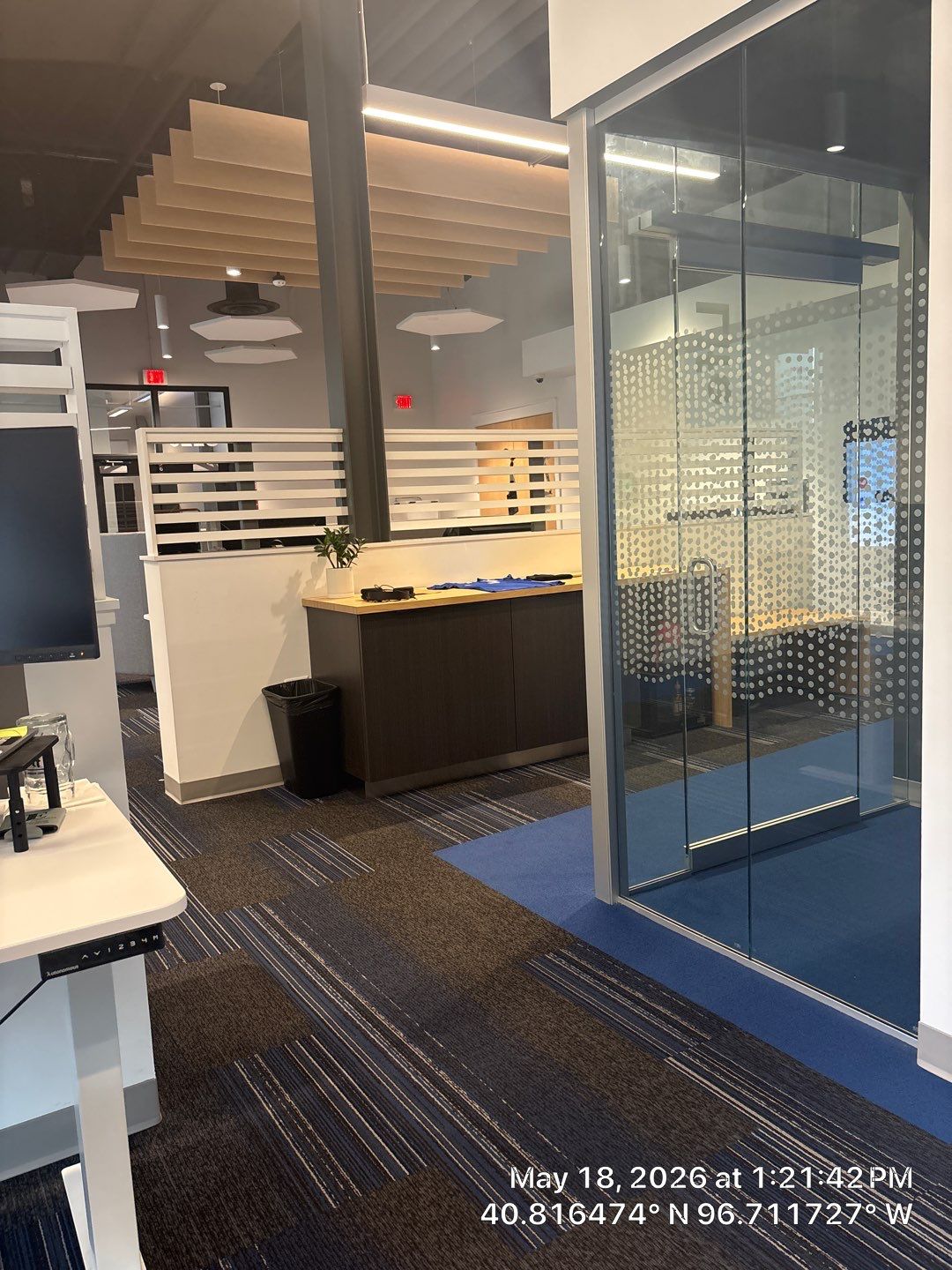 Modern Office Renovation in Lincoln Featuring Acoustic Ceilings and Glass Partitions by CompanyCam Sales Demo