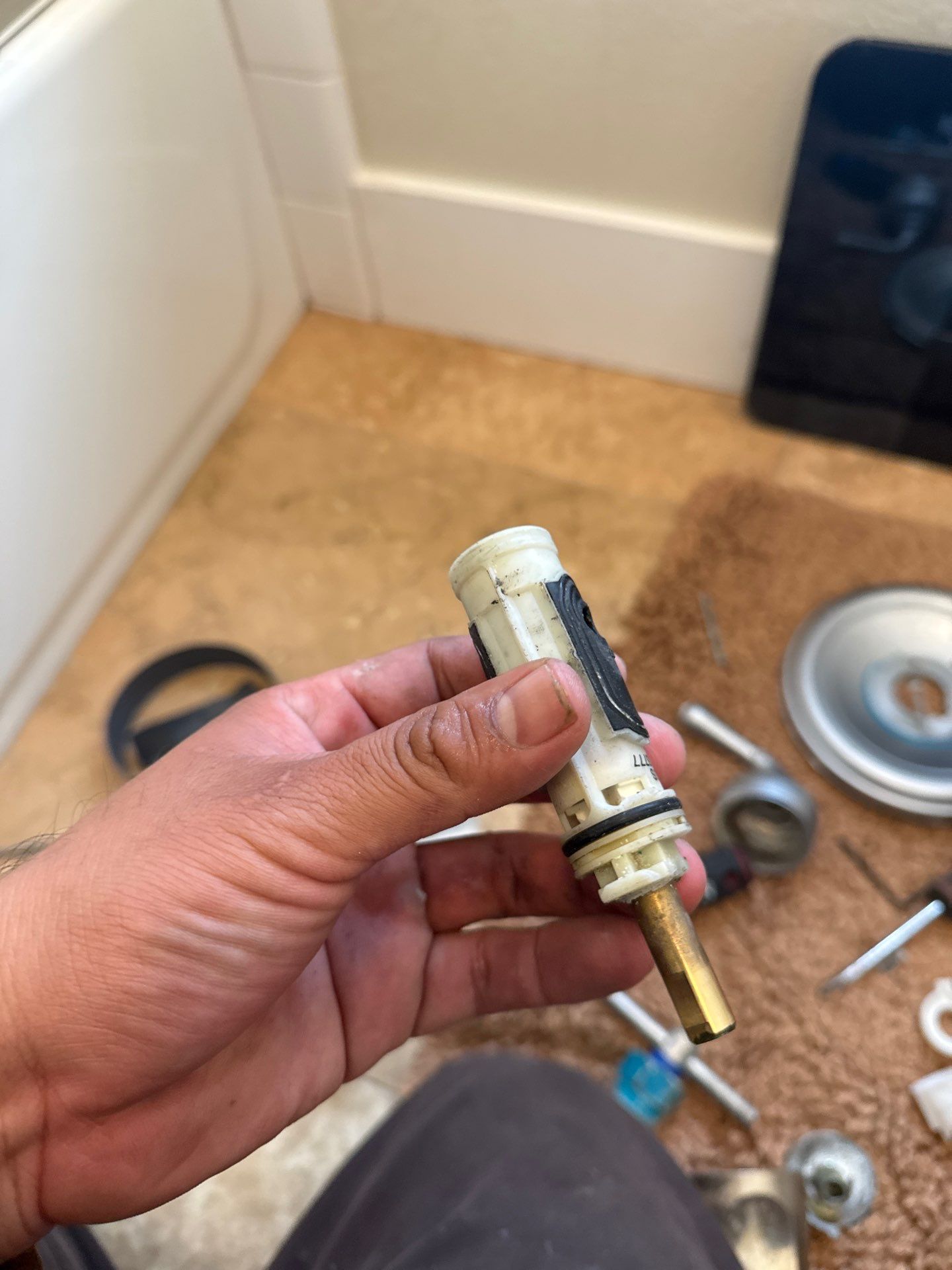 Installing a New Bathtub Faucet by Us Plumbing