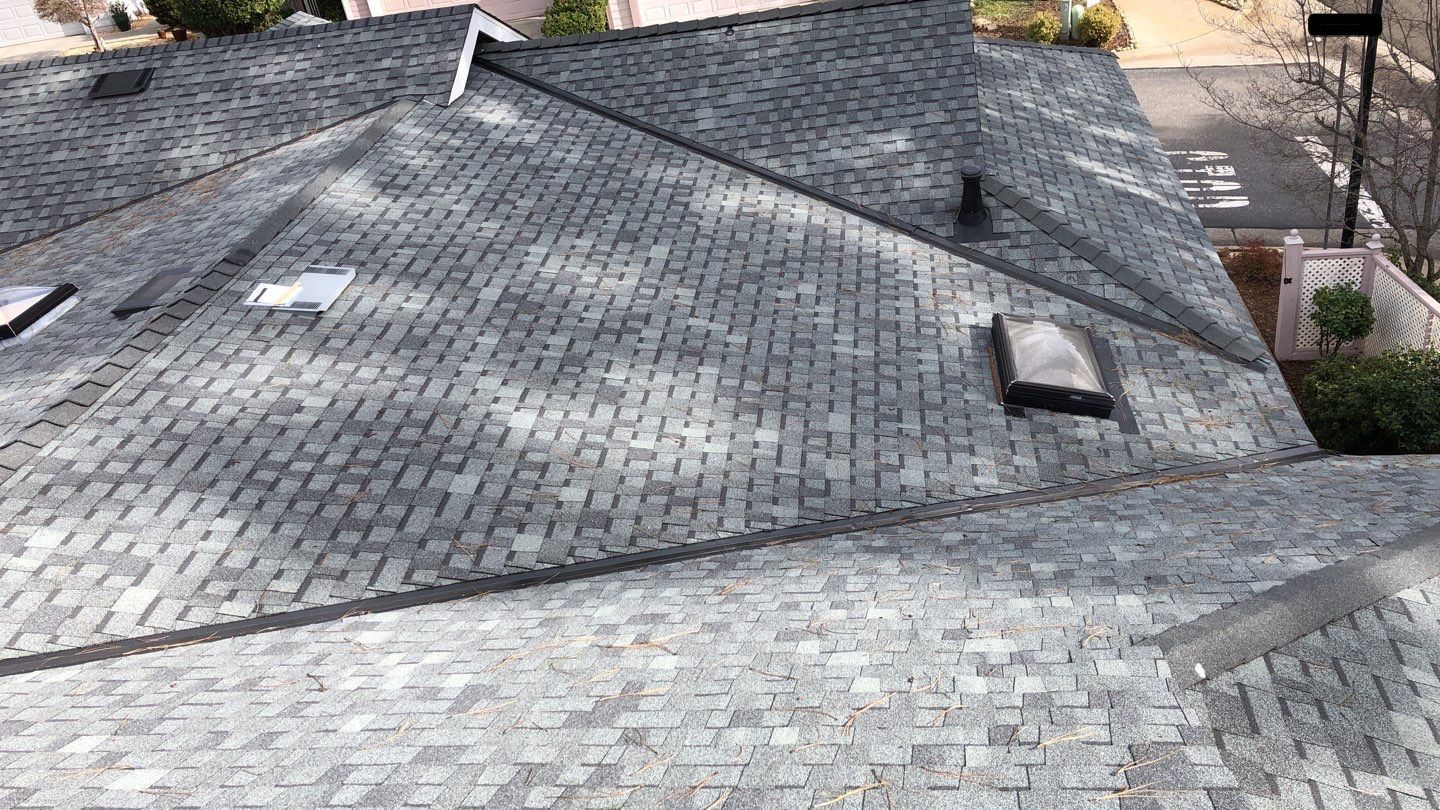 Attic Insulation, Roofing, and Solar for this in-town home by Byers Enterprises 