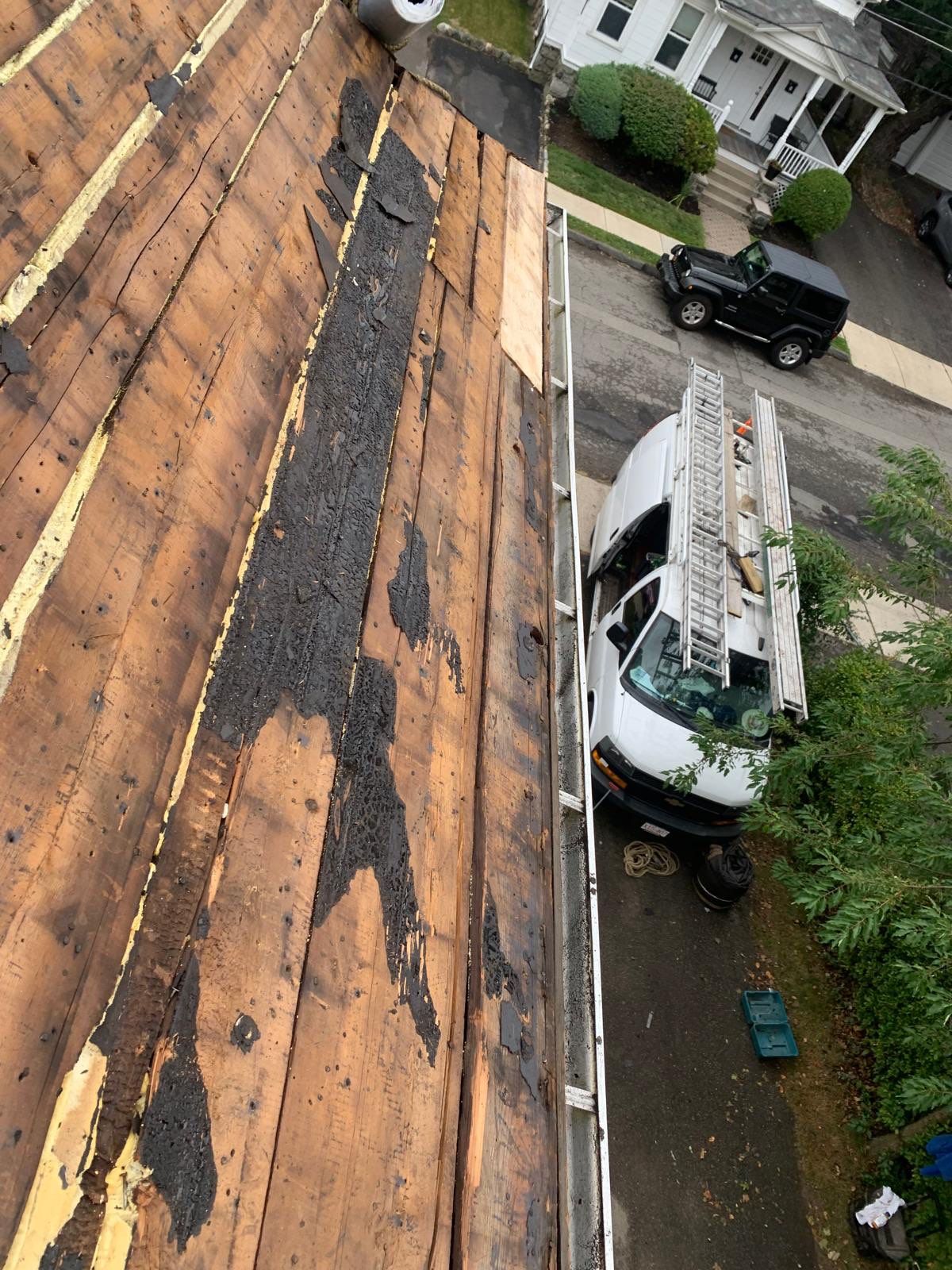 Roof Replacement with Skylight Flashing in Waltham, MA by Mighty Dog Roofing of Greater Middlesex County