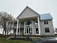 Siding Installation using JH Cedar Mill Plank by ExteriorPros