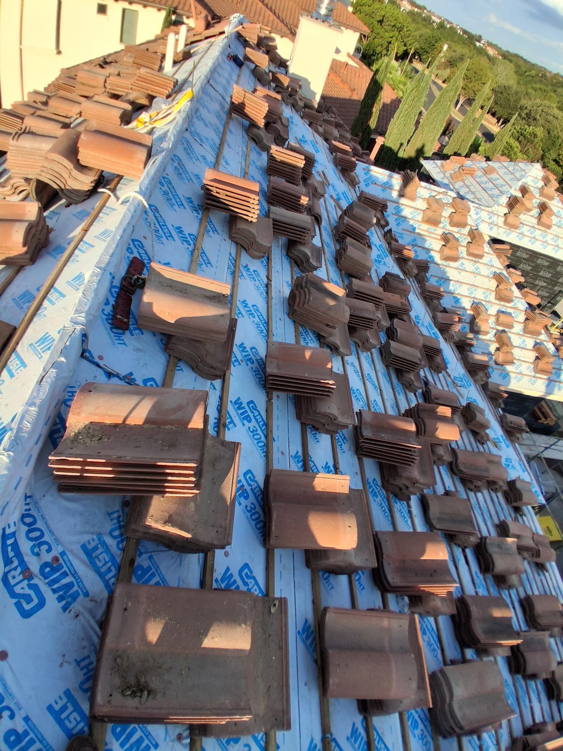 Remodel with new tile roof by REPS Austin Area Roofer